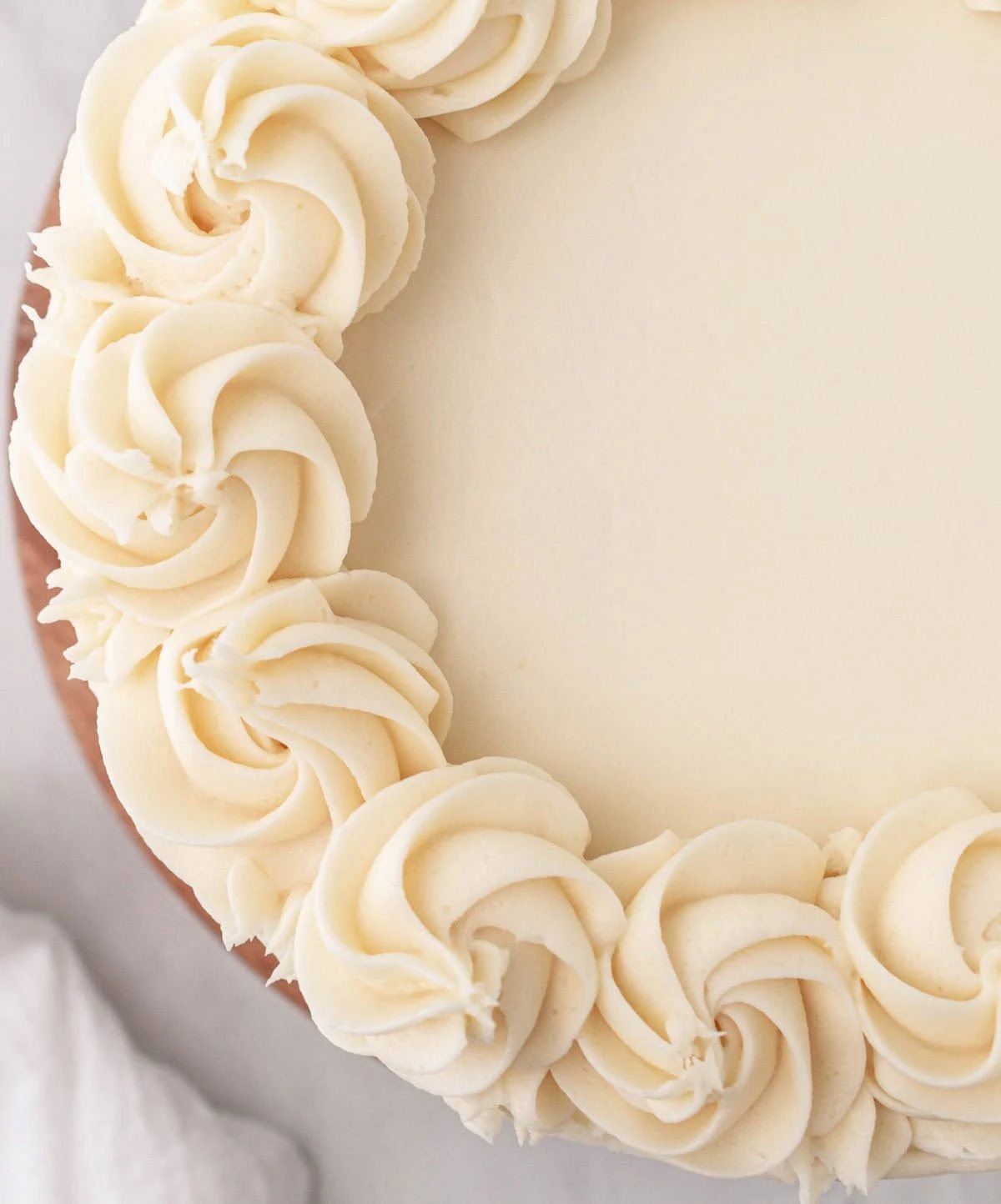 The best homemade vanilla cake recipe with vanilla bean buttercream frosting. If you’re looking for the best homemade vanilla cake recipe, this is it! This moist and fluffy vanilla cake is easy to make from scratch using simple ingredients. Perfect for birthdays or celebrations. This white cake recipe features a light, airy crumb and the most tender texture. How to frost a vanilla cake. This is a bakery-worthy dessert!