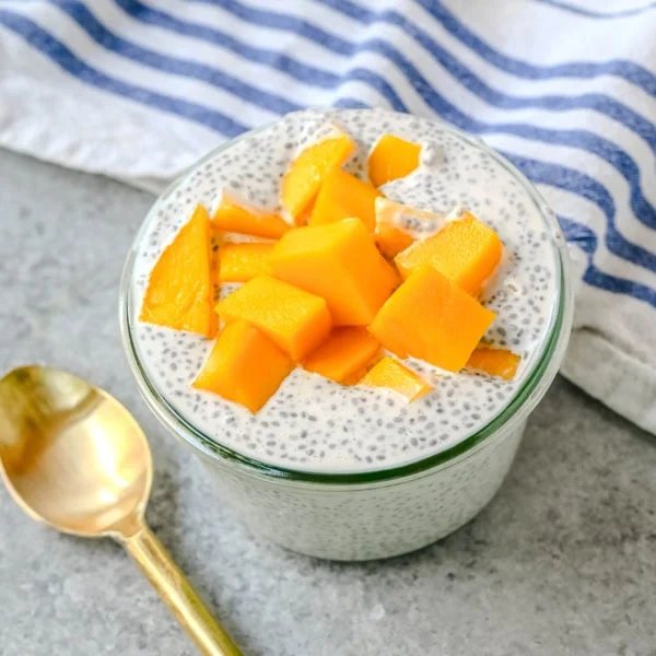 Mango Coconut Chia Pudding is a dairy-free, gluten-free, refined sugar-free, healthy dessert made with fiber rich chia seeds, rich coconut milk, real maple syrup, coconut and fresh mango. This mango chia seed pudding is a high-fiber, plant-based treat that is perfect for meal prep, clean eating, or a healthy snack.