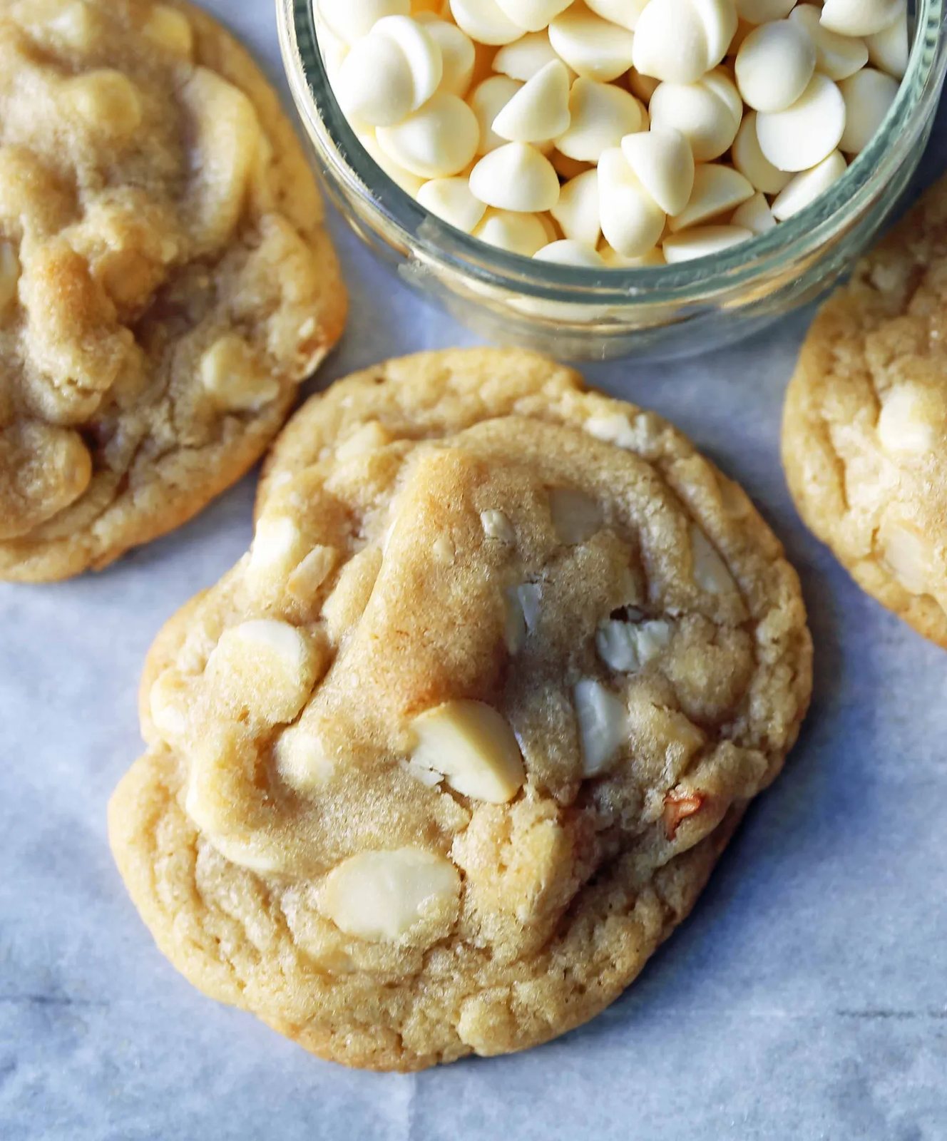 White Chocolate Macadamia Nut Cookies. Soft chewy white chocolate macadamia nut cookies are a sweet, buttery cookie and are always a crowd pleaser! www.modernhoney.com #whitechocolate #whitechocolatecookies #whitechocolatemacadamia #whitechocolatemacadamianutcookies #cookies #cookierecipe
