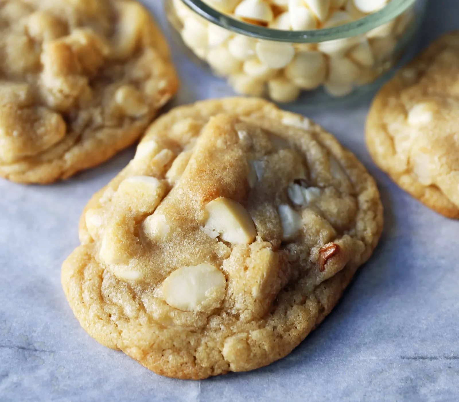 White Chocolate Macadamia Nut Cookies. Soft chewy white chocolate macadamia nut cookies are a sweet, buttery cookie and are always a crowd pleaser! www.modernhoney.com #whitechocolate #whitechocolatecookies #whitechocolatemacadamia #whitechocolatemacadamianutcookies #cookies #cookierecipe