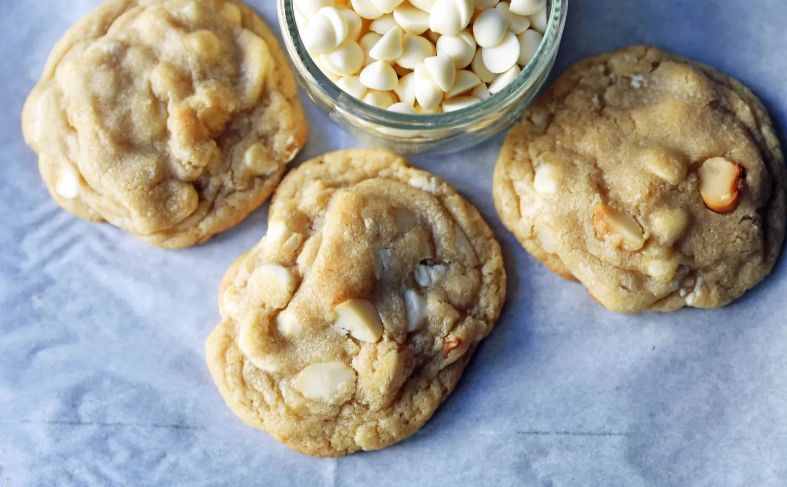 White Chocolate Macadamia Nut Cookies. Soft chewy white chocolate macadamia nut cookies are a sweet, buttery cookie and are always a crowd pleaser! www.modernhoney.com #whitechocolate #whitechocolatecookies #whitechocolatemacadamia #whitechocolatemacadamianutcookies #cookies #cookierecipe