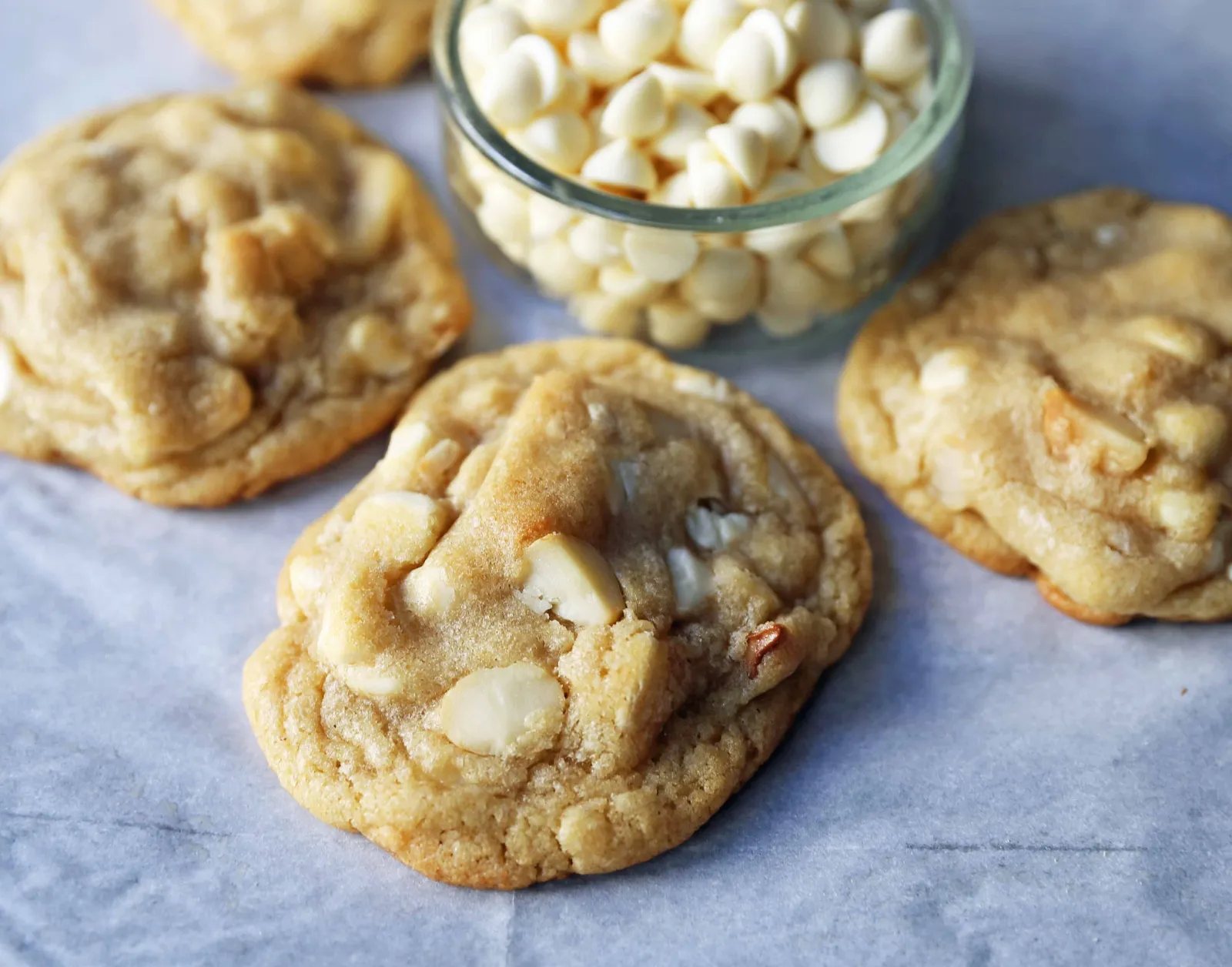 White Chocolate Macadamia Nut Cookies. Soft chewy white chocolate macadamia nut cookies are a sweet, buttery cookie and are always a crowd pleaser! www.modernhoney.com #whitechocolate #whitechocolatecookies #whitechocolatemacadamia #whitechocolatemacadamianutcookies #cookies #cookierecipe