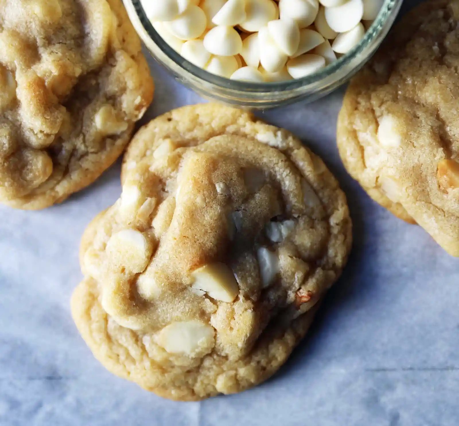 White Chocolate Macadamia Nut Cookies. Soft chewy white chocolate macadamia nut cookies are a sweet, buttery cookie and are always a crowd pleaser! www.modernhoney.com #whitechocolate #whitechocolatecookies #whitechocolatemacadamia #whitechocolatemacadamianutcookies #cookies #cookierecipe