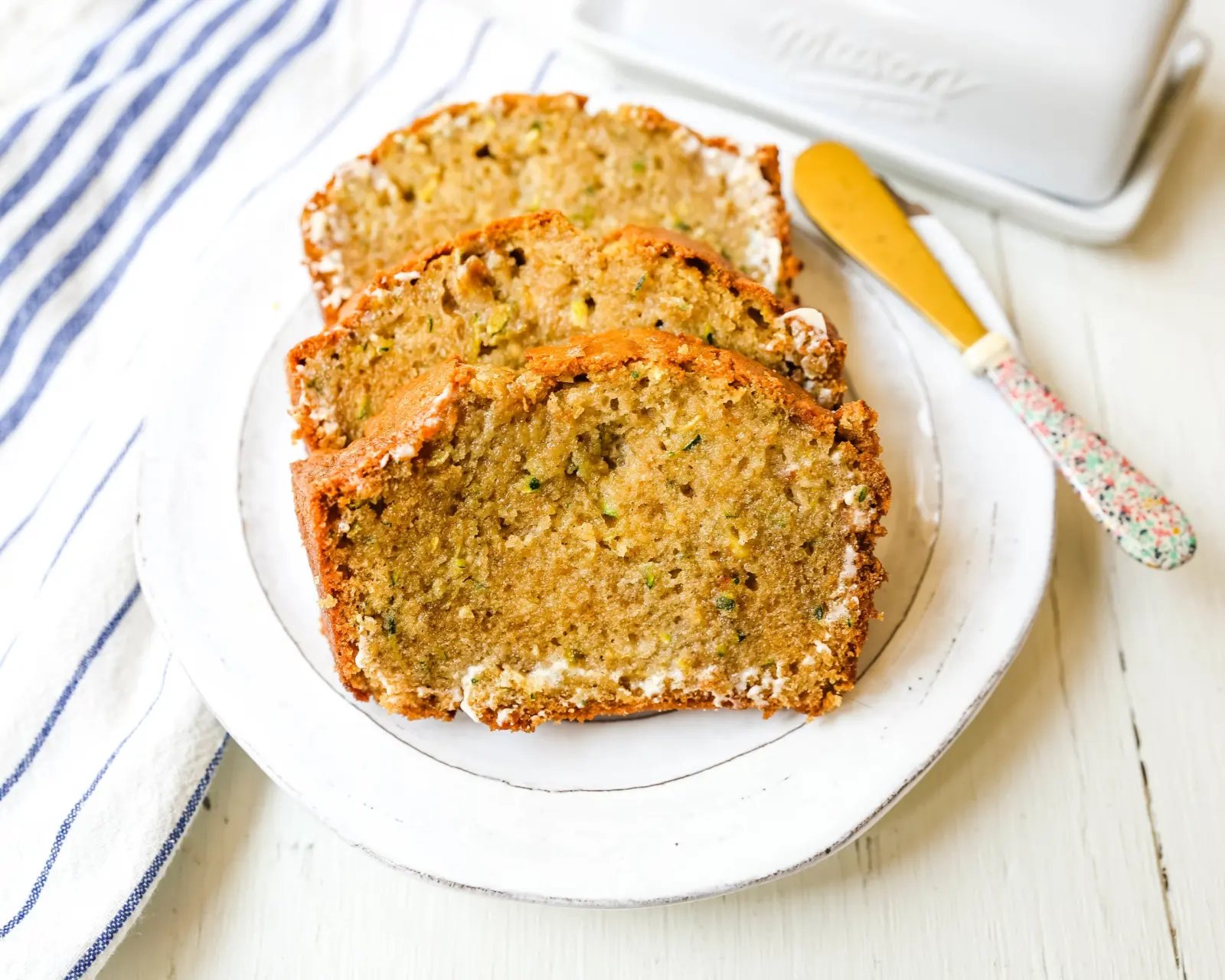 Zucchini Bread. This moist, sweet zucchini bread with a touch of spice is the best zucchini bread recipe out there! www.modernhoney.com #zucchinibread #zucchini #quickbread #bread