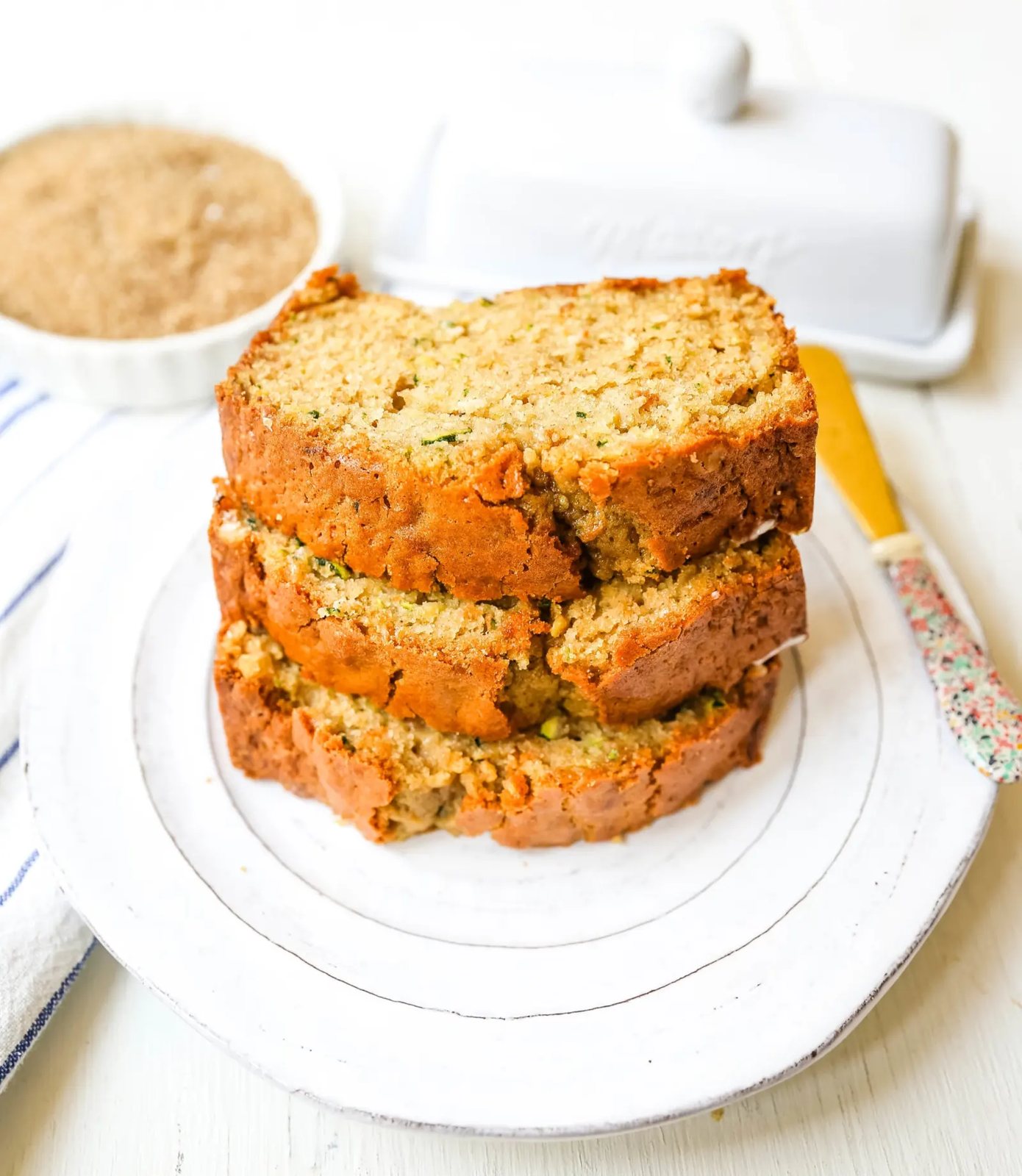Zucchini Bread. This moist, sweet zucchini bread with a touch of spice is the best zucchini bread recipe out there! www.modernhoney.com #zucchinibread #zucchini #quickbread #bread