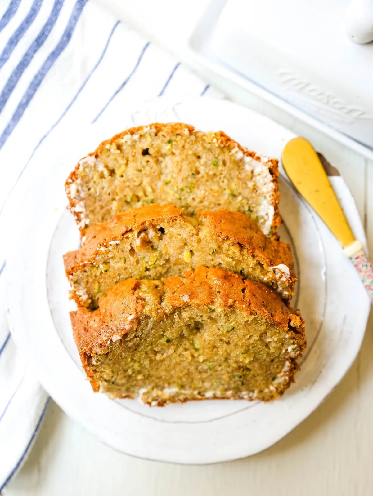 Zucchini Bread. This moist, sweet zucchini bread with a touch of spice is the best zucchini bread recipe out there! www.modernhoney.com #zucchinibread #zucchini #quickbread #bread