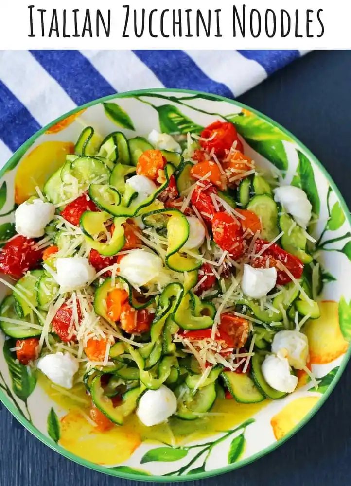 Zucchini Noodles with Tomatoes, Fresh Mozzarella, and Basil. How to make spiralized zucchini noodles (zoodles). Healthy, delicious, and flavorful side dish. The best way to eat your veggies! www.modernhoney.com #zoodles #zucchini #zucchininoodles