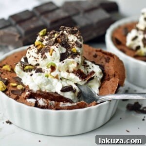 Flourless Chocolate Molten Lava Cake, served with a scoop of vanilla ice cream, embodying a perfect homemade gluten-free chocolate cake. This image is illustrative of the delicious results from the best molten lava cake recipe.
