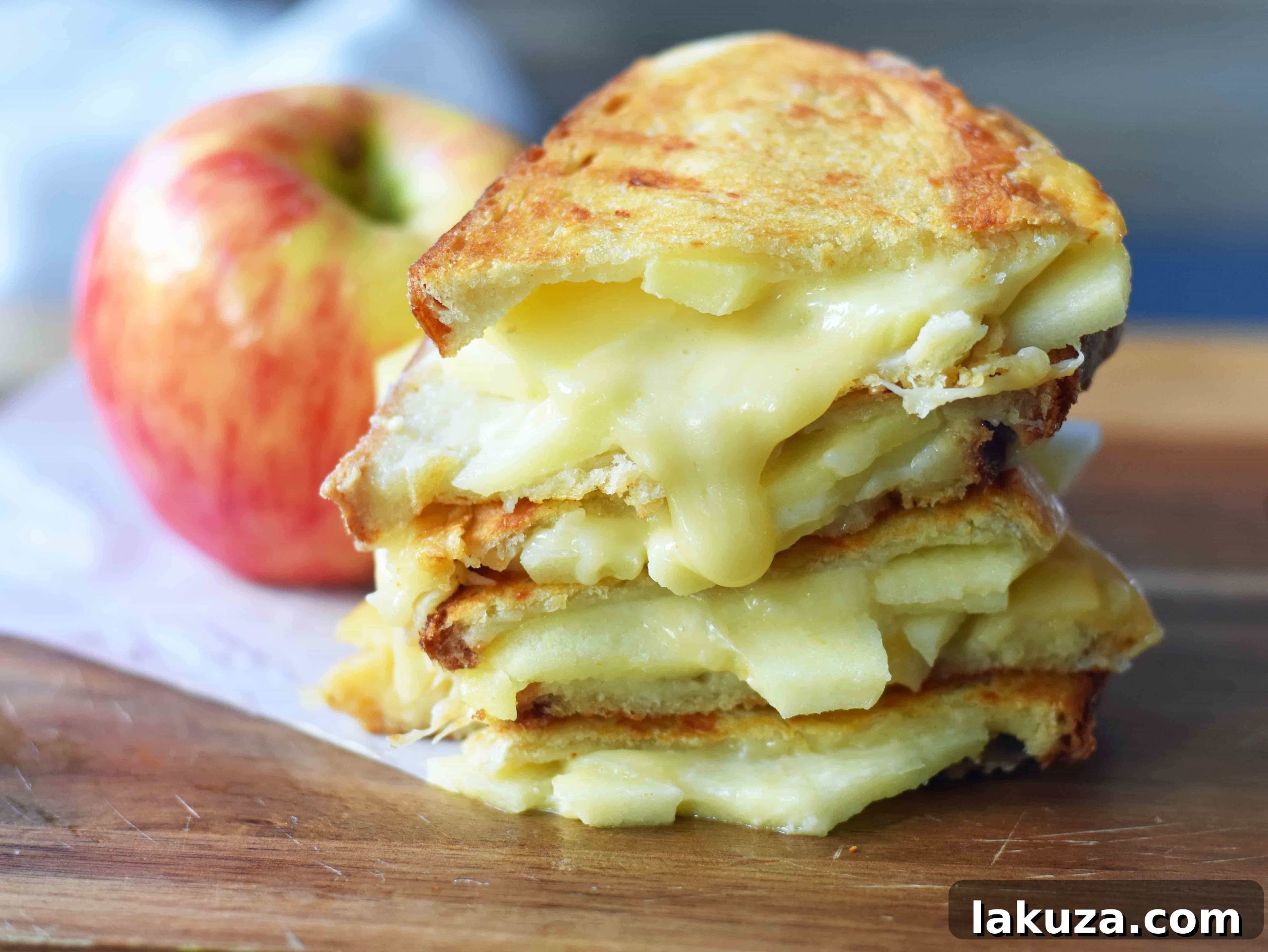 Honeycrisp Apple & Smoky Bacon Gouda Melt 3 A gourmet grilled cheese sandwich highlighting smoked gouda cheese and sweet Honeycrisp apple slices on sourdough bread. Tips for making the best grilled cheese at home.