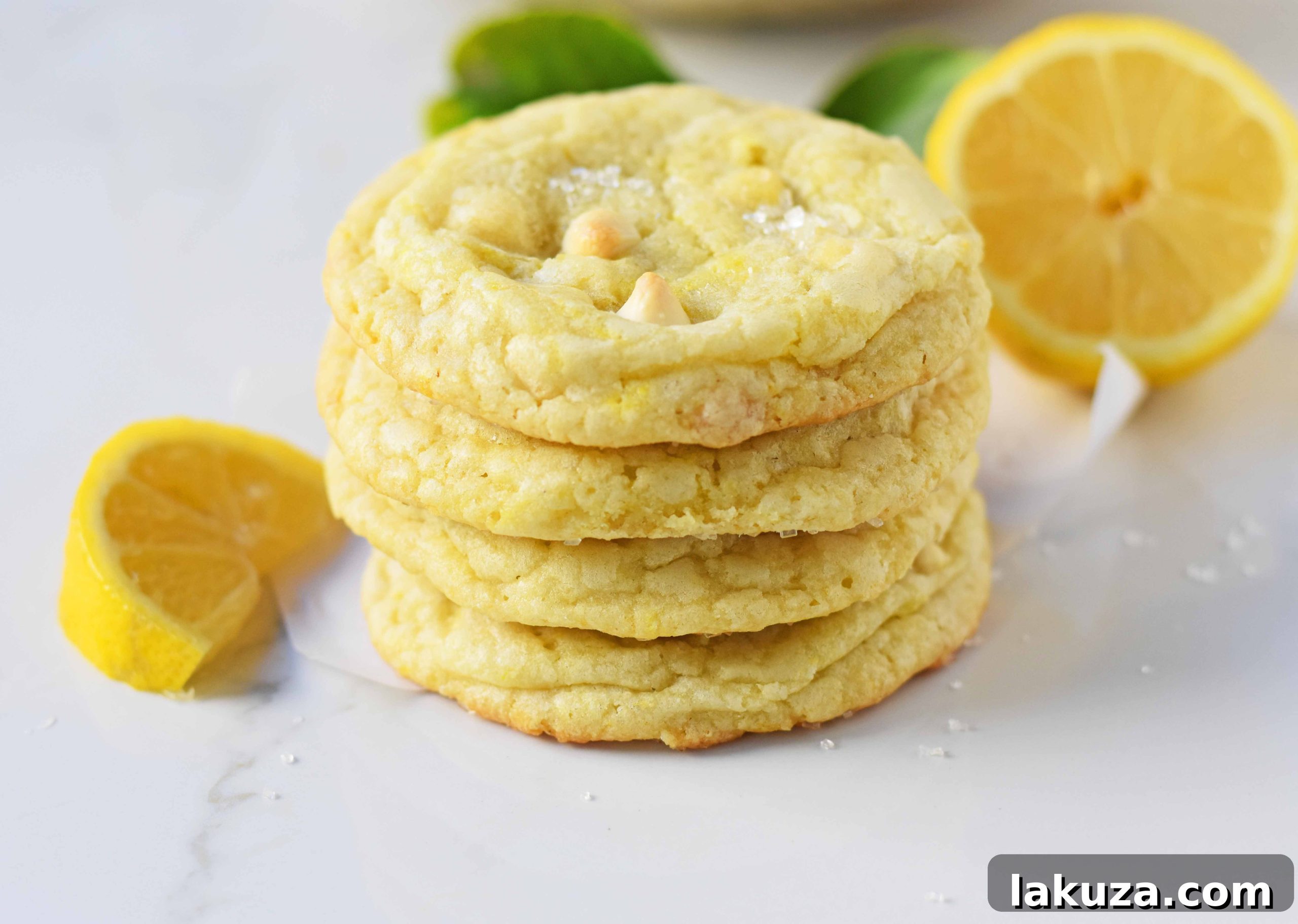 Lemon White Chocolate Chip Cookies. Soft and chewy lemon sugar cookies with white chocolate chips. White Chocolate Lemon Cookies Recipe. www.modernhoney.com
