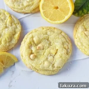 Lemon White Chocolate Chip Cookies. Soft and chewy lemon sugar cookies with white chocolate chips. White Chocolate Lemon Cookies Recipe. www.modernhoney.com