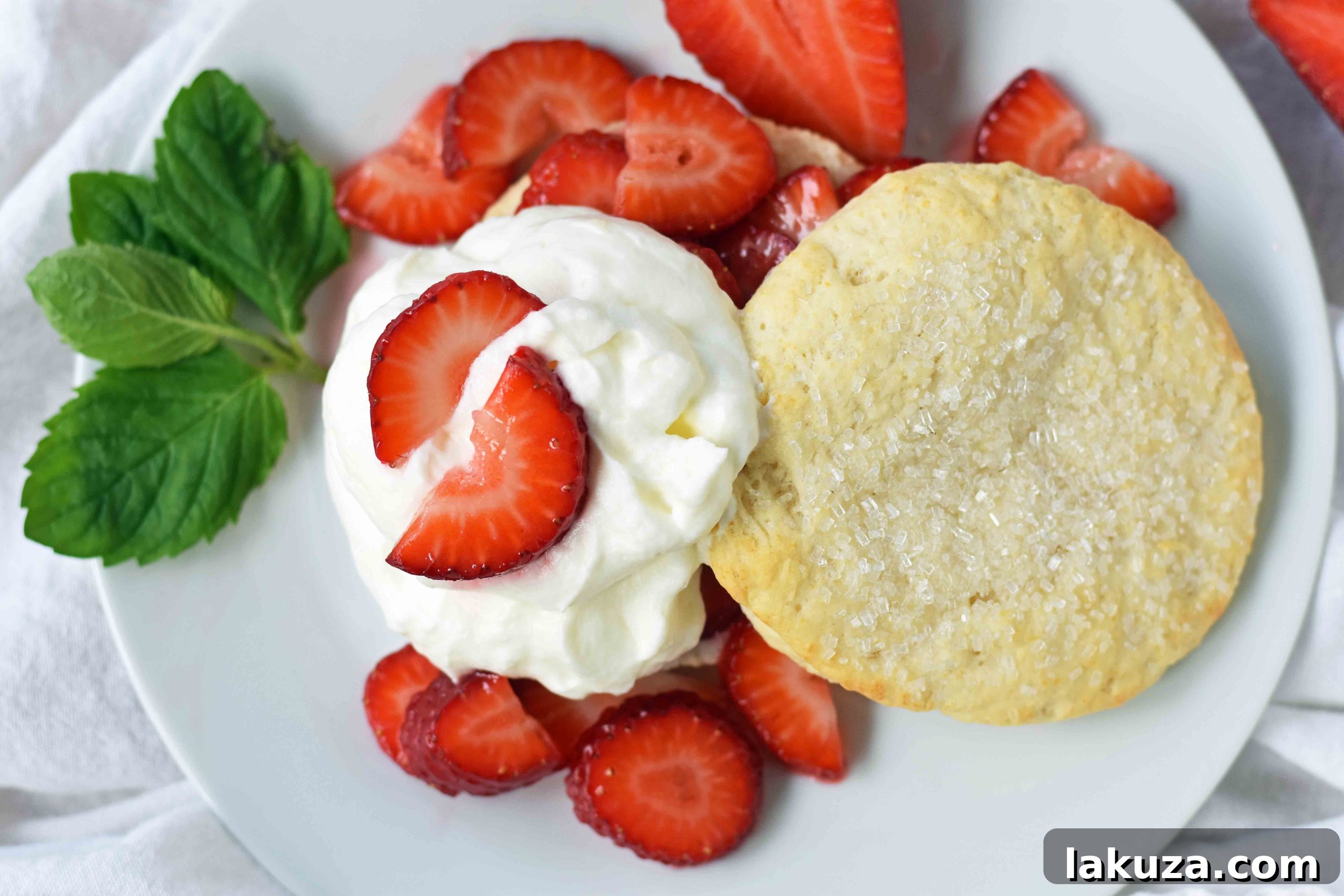 Crimson Berry Dream 8 Strawberry Shortcake with Sweet Biscuits, Sugared Strawberries, and Homemade Sweetened Whipped Cream. The BEST Strawberry Shortcake Recipe. A Southern classic Strawberry Shortcake with biscuits. www.modernhoney.com