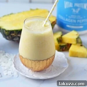 Healthy Pina Colada Smoothie. Fresh pineapple, coconut milk, banana, a touch of honey, and optional coconut yogurt. A creamy sweet healthy coconut pineapple smoothie. www.modernhoney.com