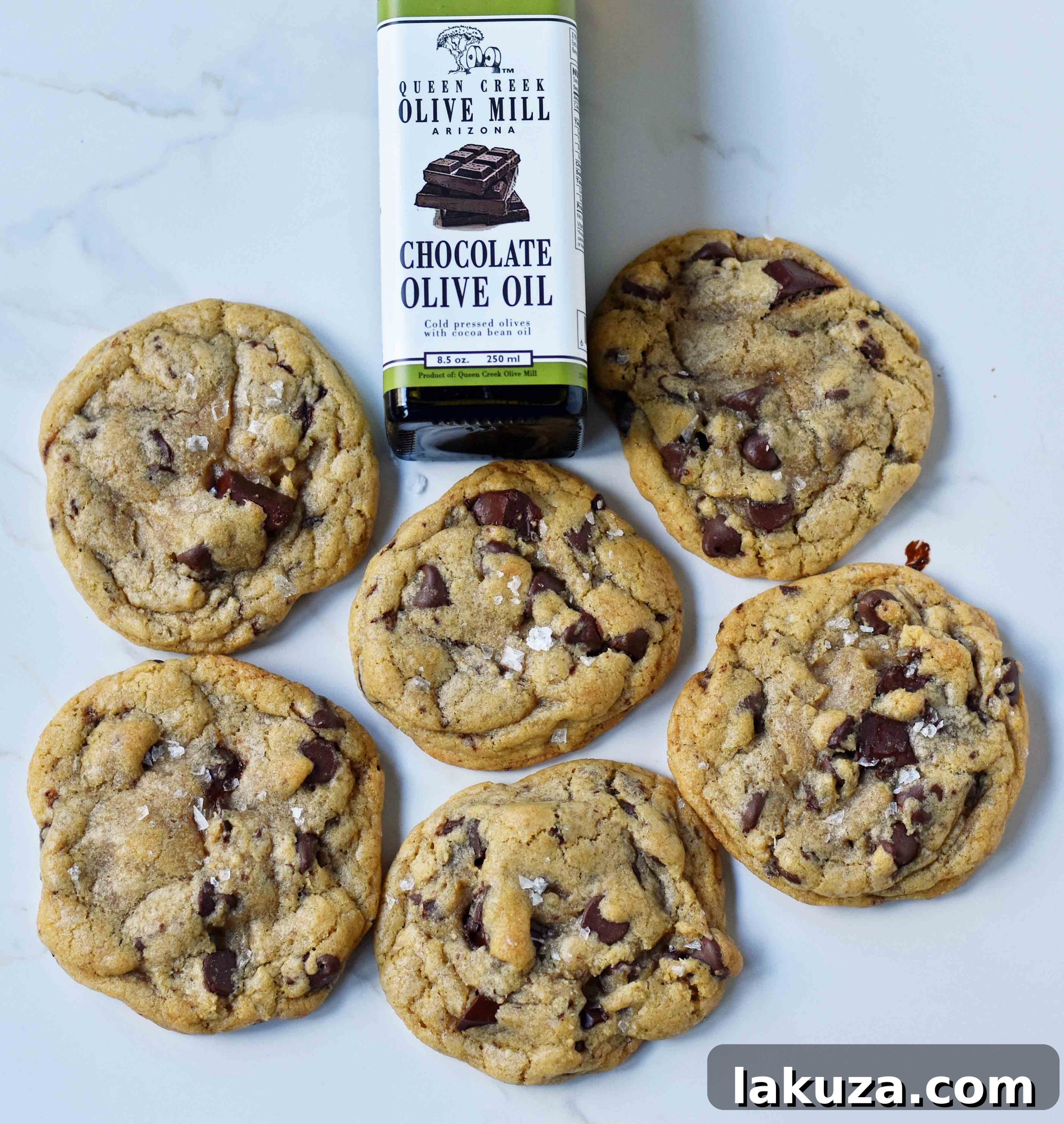Rich Dark Chocolate Olive Oil Cookies 6 A cooling rack filled with freshly baked Dark Chocolate Chunk Olive Oil Cookies, ready to be enjoyed.