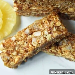 Tropical Coconut Pineapple Macadamia Granola Bars - Wholesome energy bar recipe.