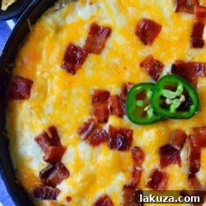 Creamy Jalapeno Popper Dip with Bacon. Homemade Jalapeno Popper Dip made with cream cheese, sour cream, mayo, fresh jalapenos, two kinds of Mexican cheeses, and crispy bacon. The perfect party appetizer.
