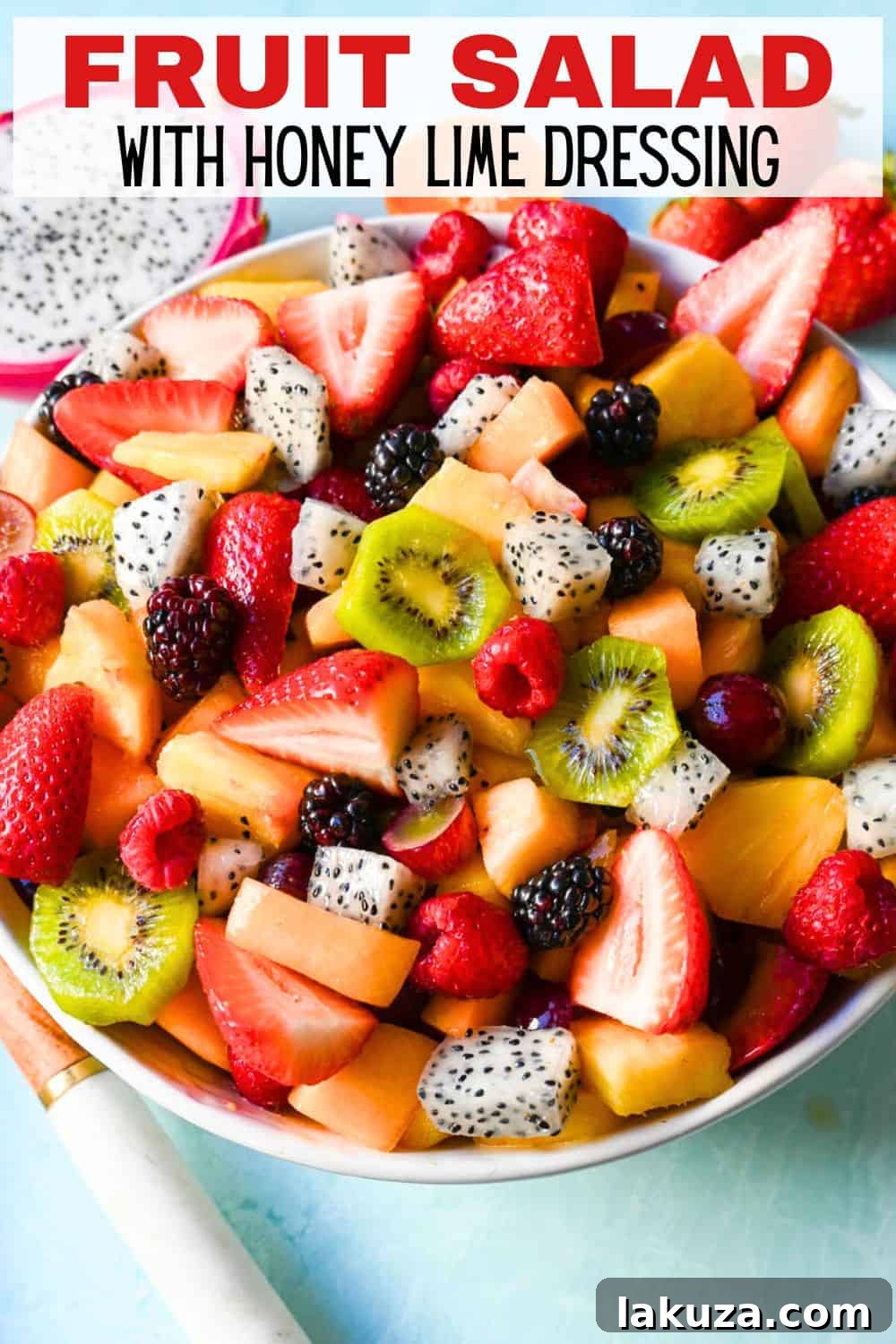 A bright and fresh fruit salad that is perfect for summertime! Made with vibrant and flavorful seasonal fruits and a sweet and simple honey lime dressing. The perfect fruit salad recipe!