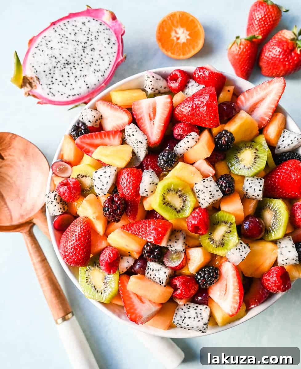 A bright and fresh fruit salad that is perfect for summertime! Made with vibrant and flavorful seasonal fruits and a sweet and simple honey lime dressing. The perfect fruit salad recipe!