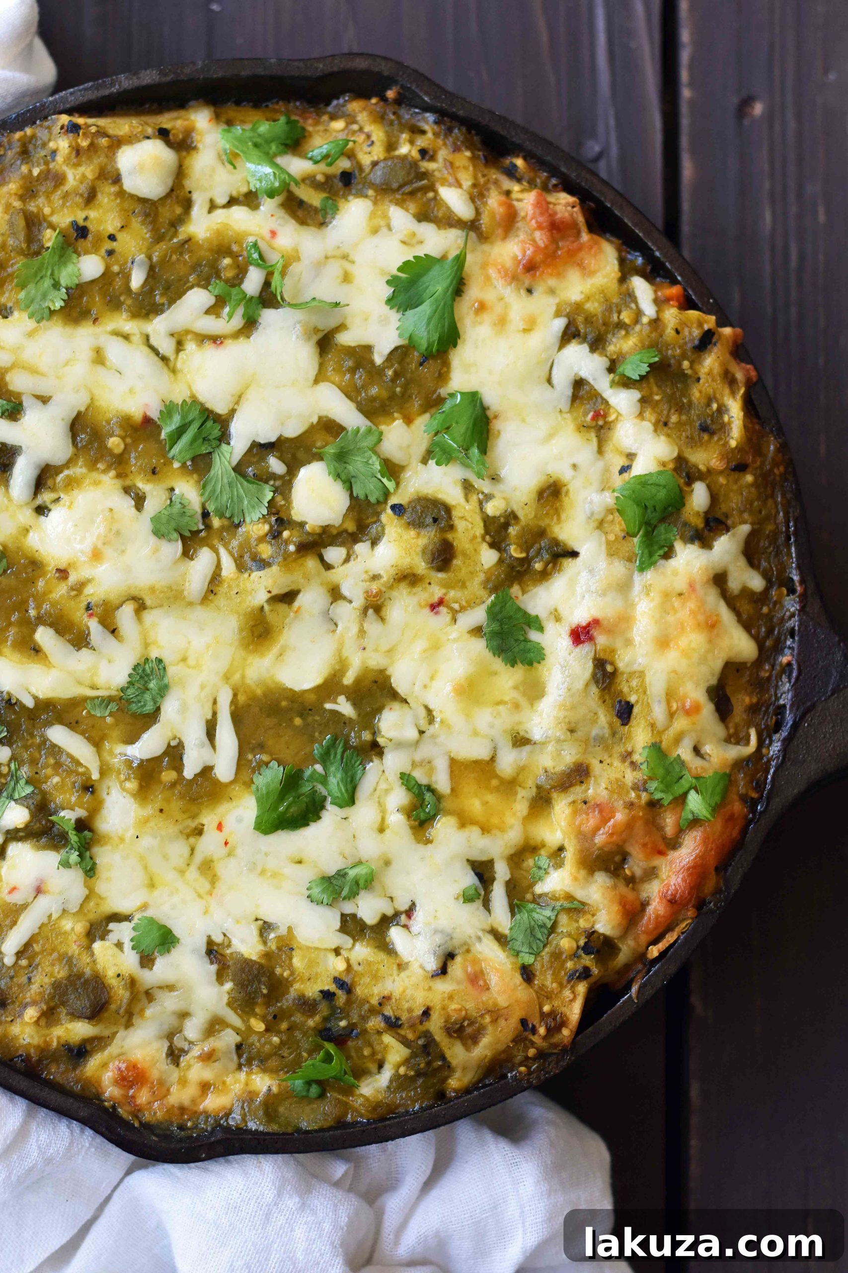 Zesty Sweet Potato and Black Bean Enchiladas 10 An appetizing overhead view of a plate of Sweet Potato Black Bean Enchiladas, beautifully garnished, highlighting a healthy and satisfying meal option.