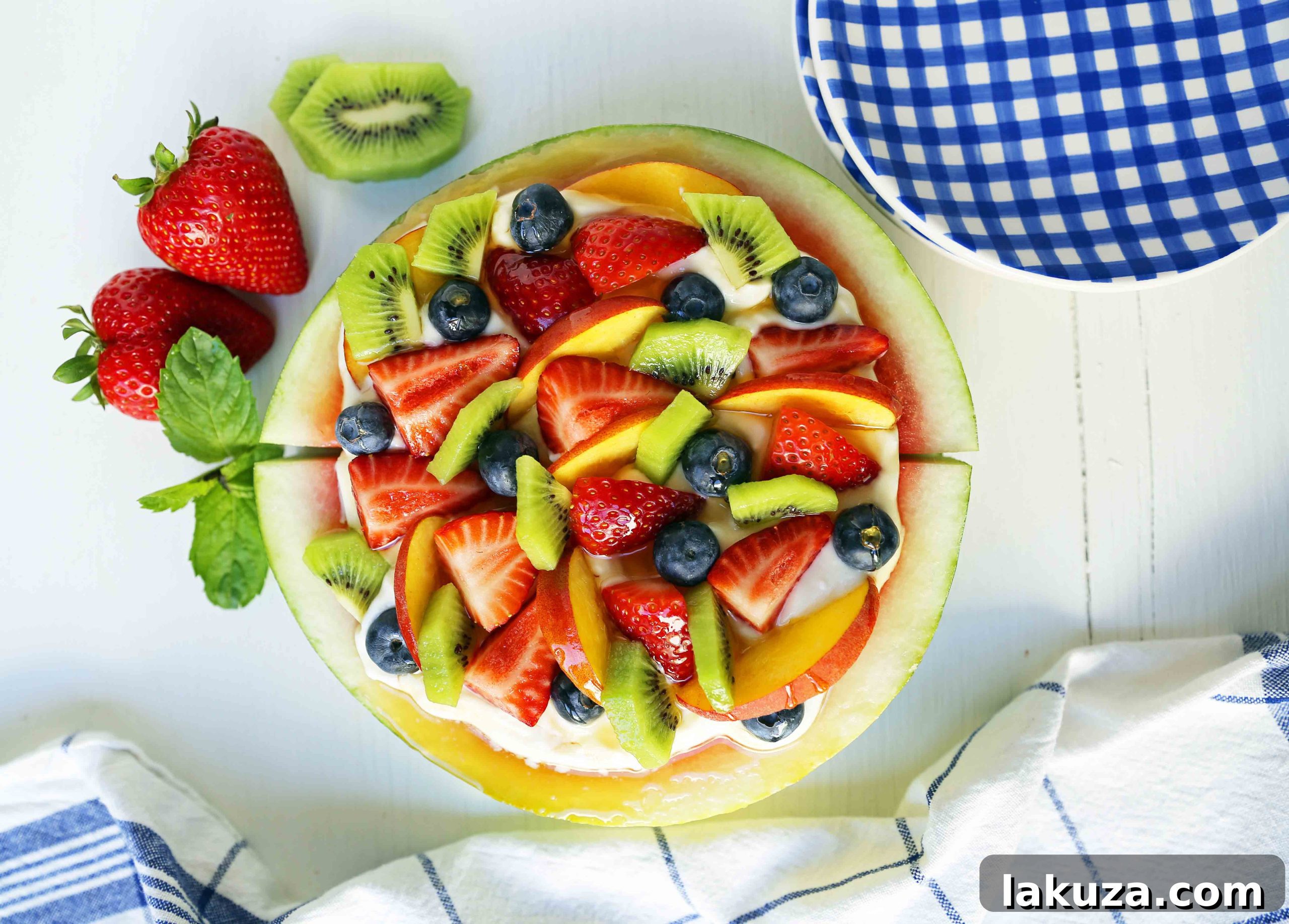 Watermelon Fruit Pizza Cake. A healthy, no-guilt summer dessert recipe. Fresh fruit dessert. The ultimate watermelon and fresh fruit dessert. www.modernhoney.com #fruit #fruitdessert #freshfruit #summer #summerdessert