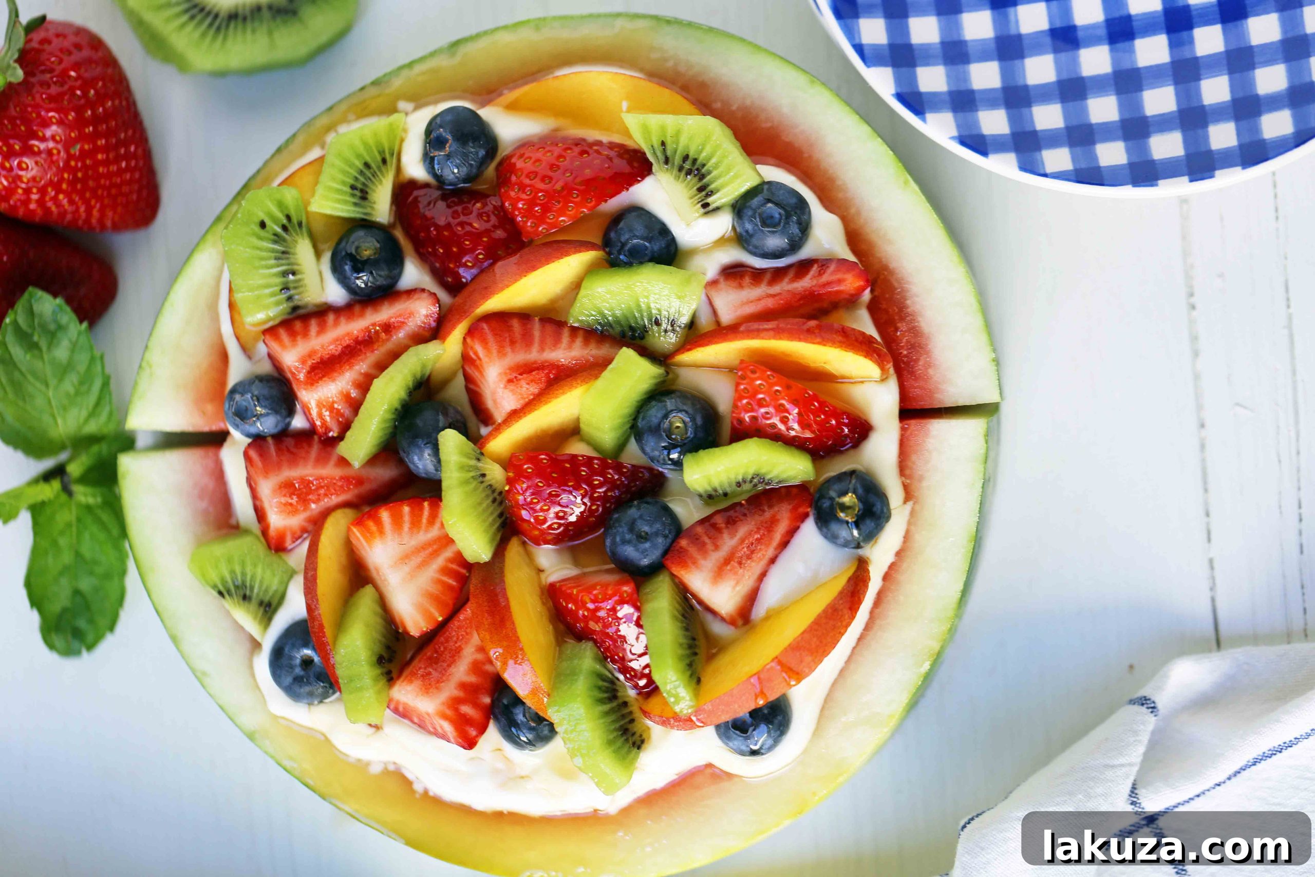 Watermelon Fruit Pizza Cake. A healthy, no-guilt summer dessert recipe. Fresh fruit dessert. The ultimate watermelon and fresh fruit dessert. www.modernhoney.com #fruit #fruitdessert #freshfruit #summer #summerdessert