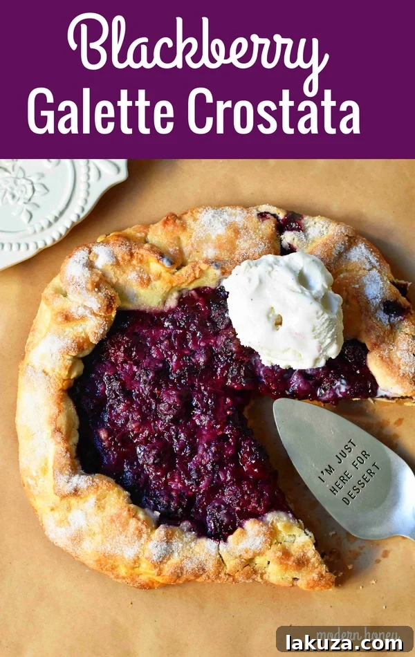 The finished Blackberry Galette Crostata, a simple yet elegant dessert, garnished for serving.