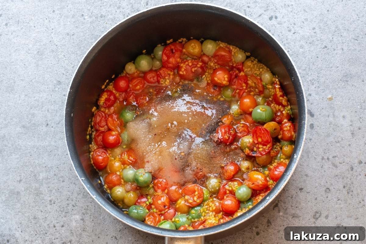 Sweet & Savory Tomato Jam 5 Tomatoes, sugar, and spices in pot before cooking.