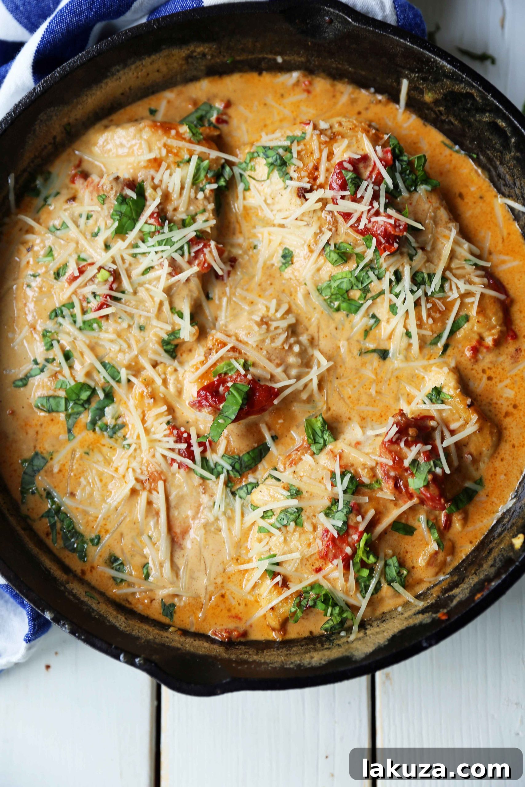 Close-up of Skillet Chicken with Sun-Dried Tomato Cream Sauce, showing the creamy texture and chicken pieces