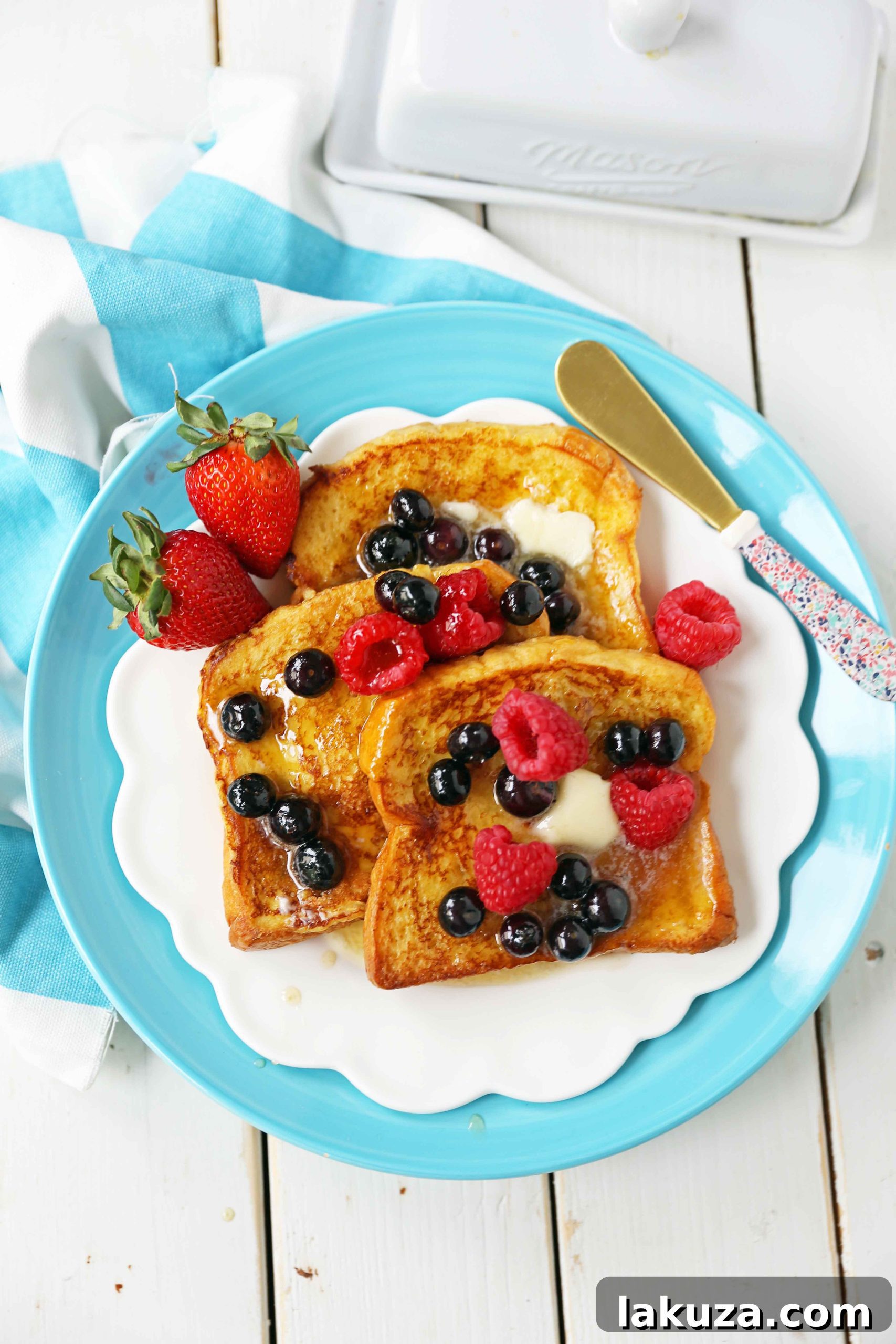 Vanilla Bean French Toast 3 Vanilla Brioche French Toast topped with fresh fruit and powdered sugar