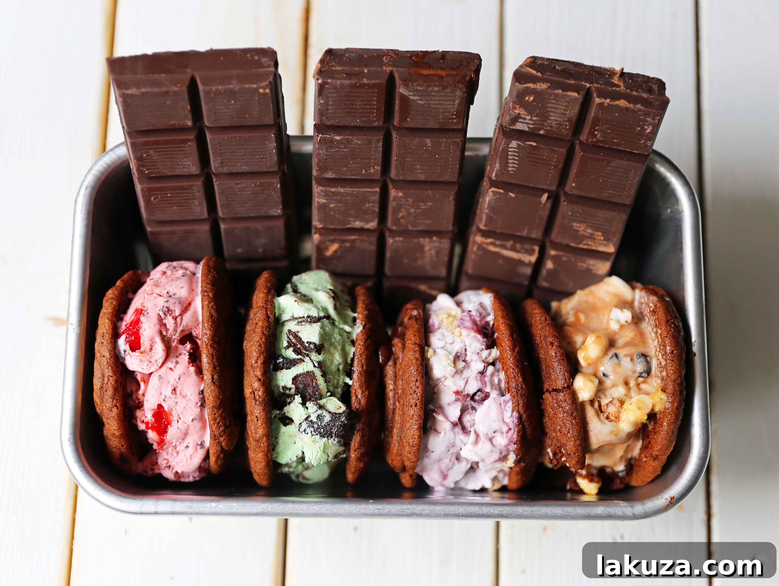 Soft double chocolate cookies stuffed with creamy ice cream. Delicious homemade ice cream sandwiches recipe. Perfect for cooling down in summer. Modern Honey dessert ideas.