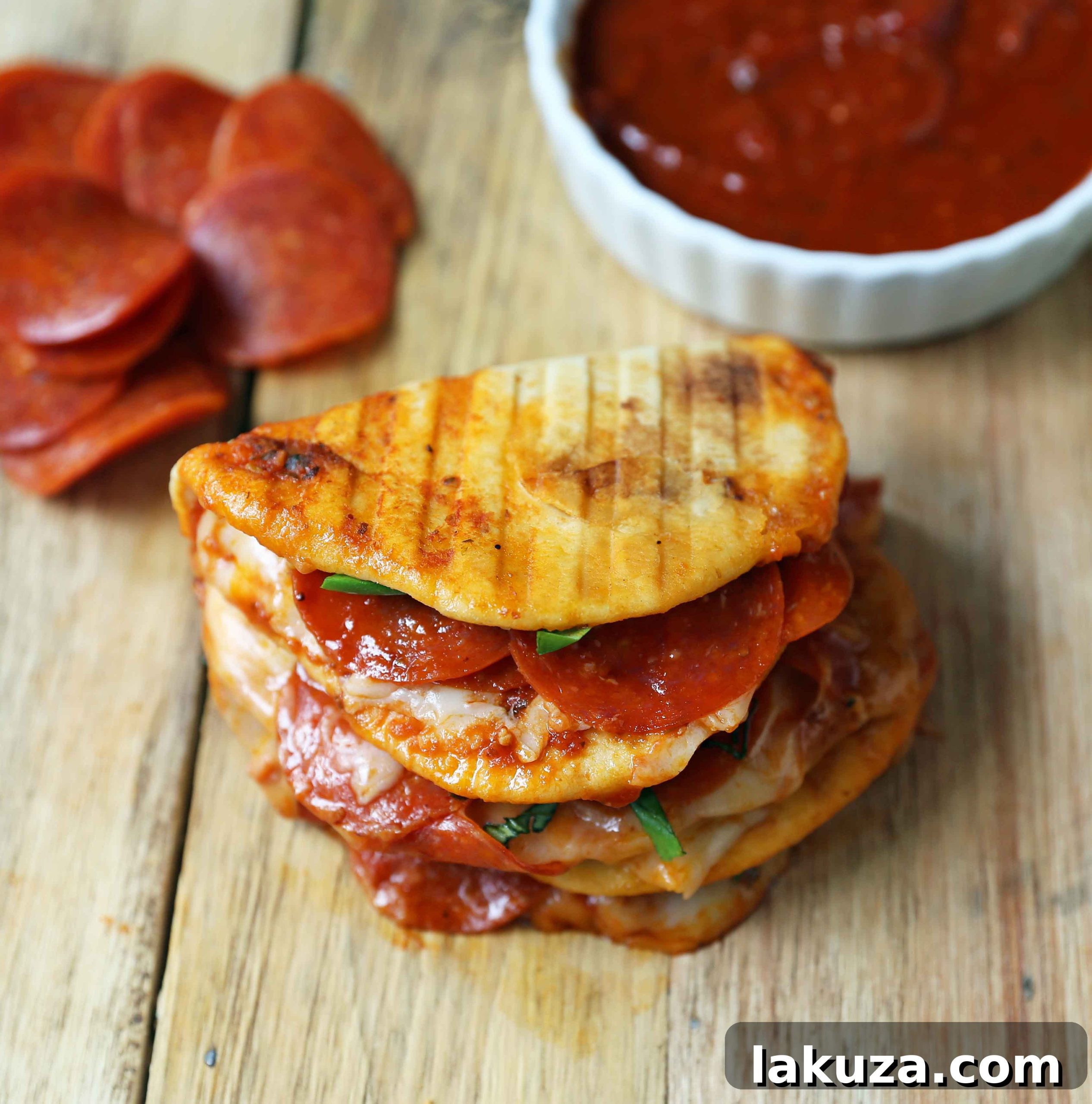 Pepperoni Pizza Flatbread Pizza. Soft chewy naan bread topped with marinara sauce, mozzarella cheese, and pepperonis. Pepperoni and Cheese Panini baked until toasty and golden brown.