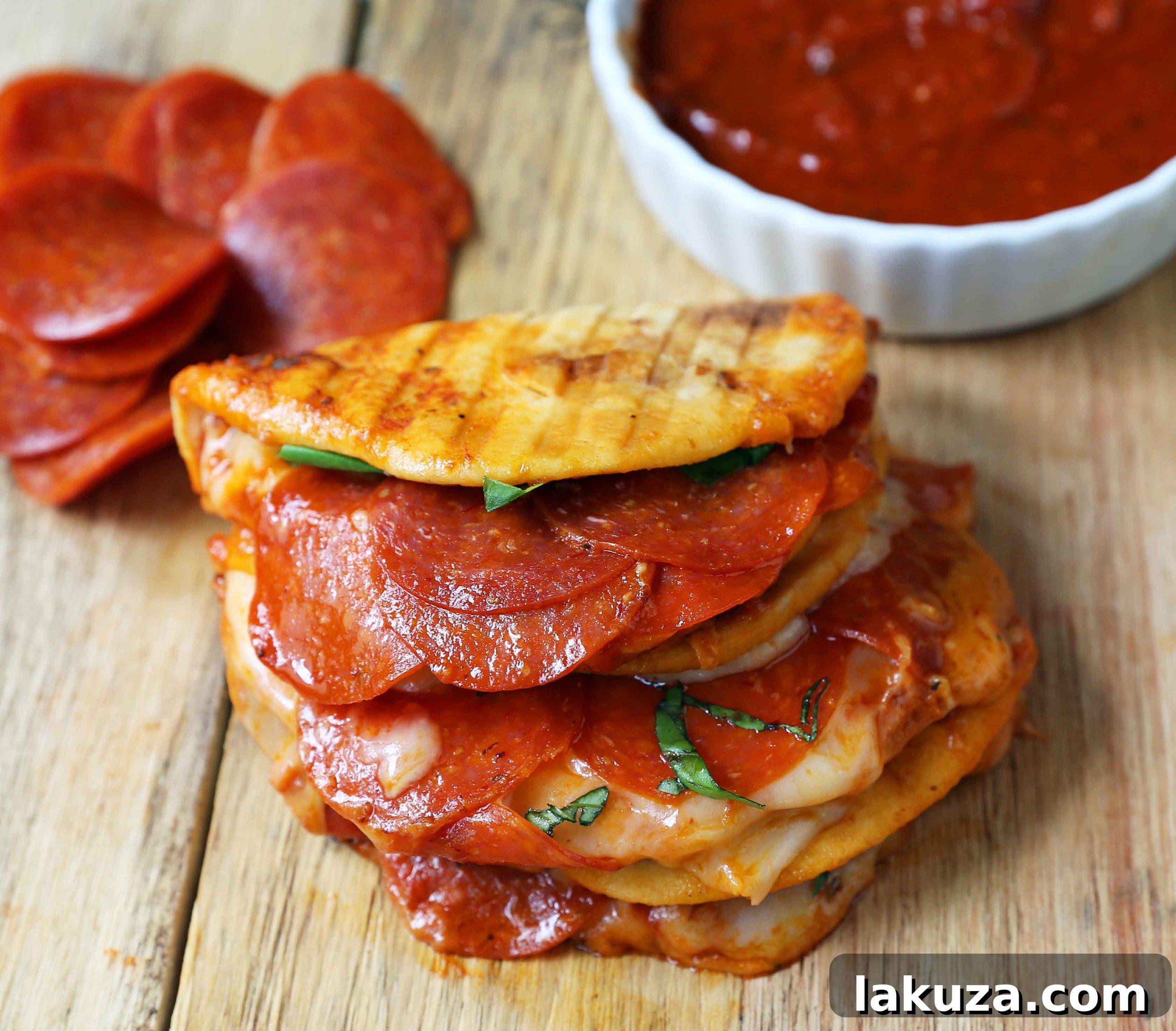 Pepperoni Pizza Flatbread Pizza. Soft chewy naan bread topped with marinara sauce, mozzarella cheese, and pepperonis. Pepperoni and Cheese Panini baked until toasty and golden brown.