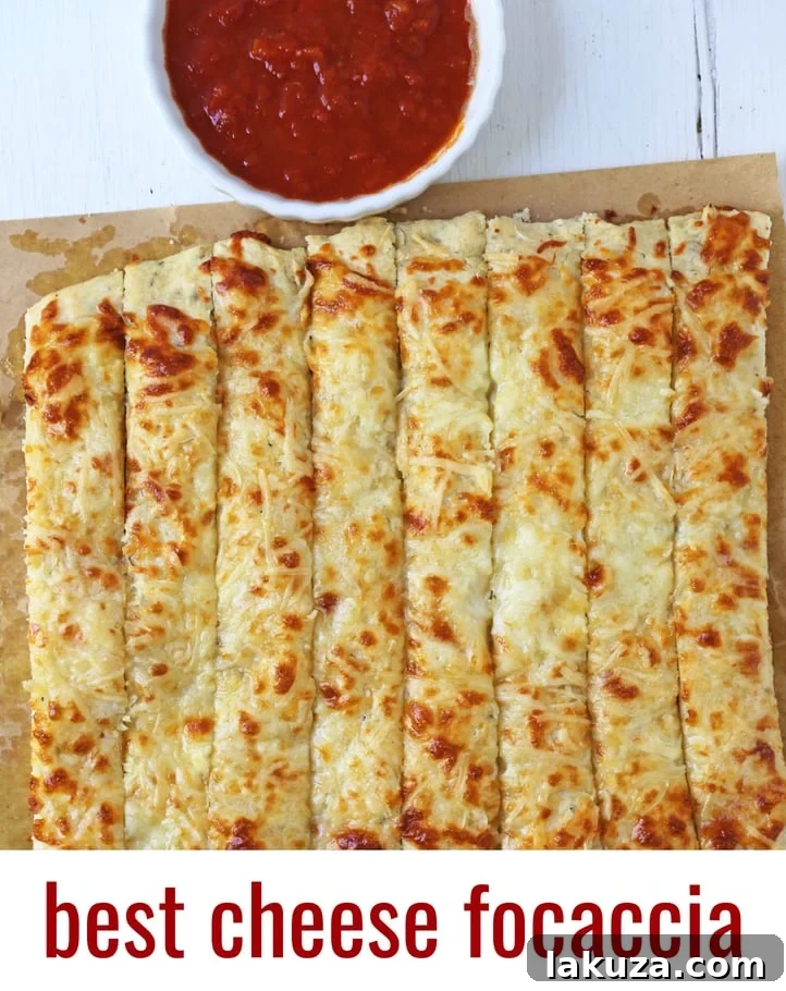 Cheese Focaccia Bread Recipe. How to make garlic cheese focaccia bread from scratch. The best garlic cheese breadsticks. www.moderhoney.com #focaccia