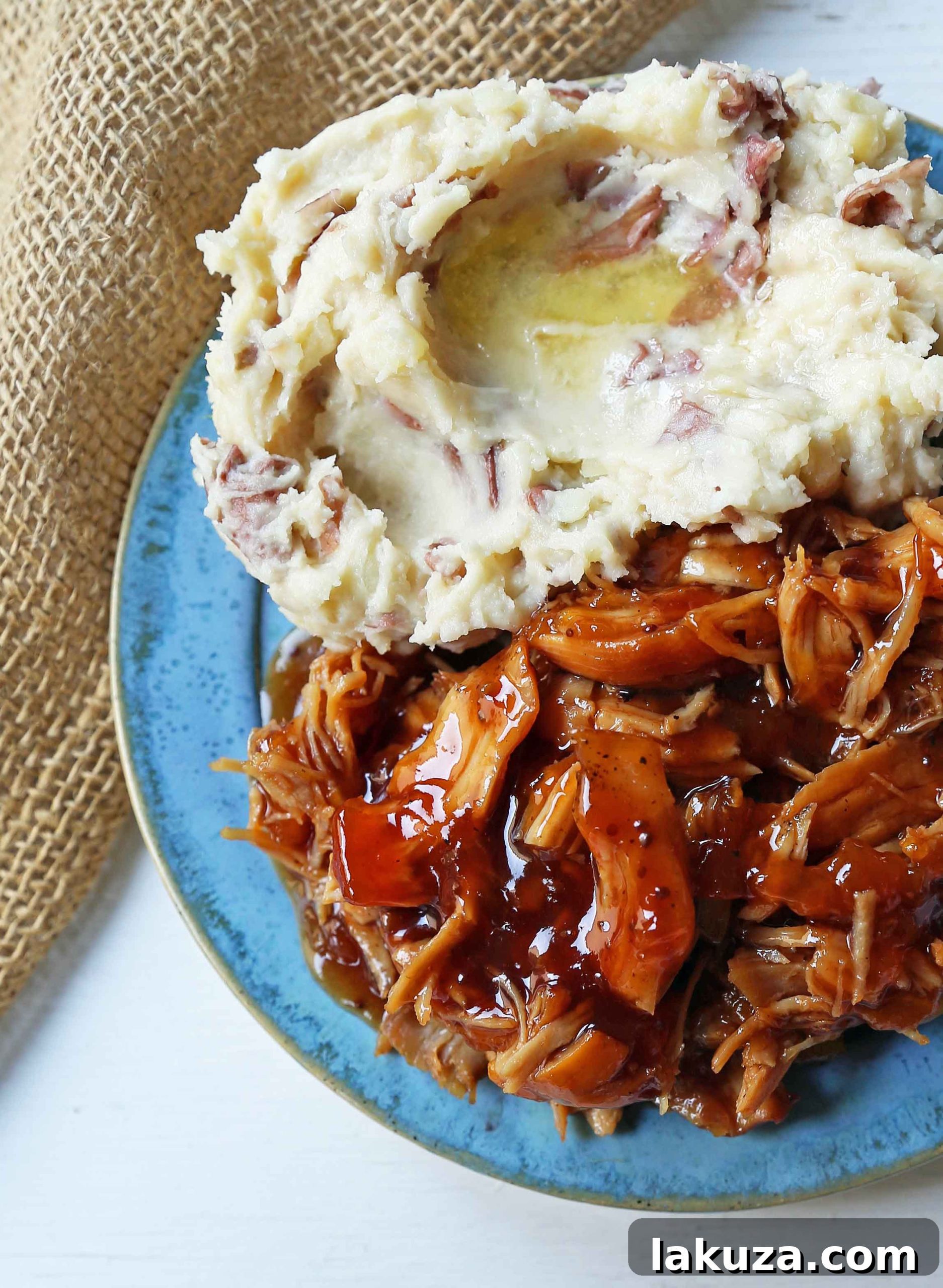 5-Ingredient Slow Cooker Peach BBQ Chicken: Tender chicken breasts coated in a sweet and smoky peach barbecue glaze, cooked effortlessly in a crockpot. A perfect quick and flavorful dinner solution.