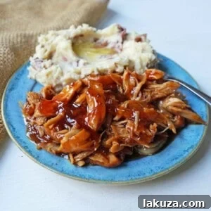 Slow Cooker Peach Barbecue Sauce Chicken. 5-Ingredient Crockpot Chicken with Sweet Peach BBQ Glaze. A fast and flavorful slow cooker chicken with peach bbq sauce. www.modernhoney.com #slowcooker #crockpot