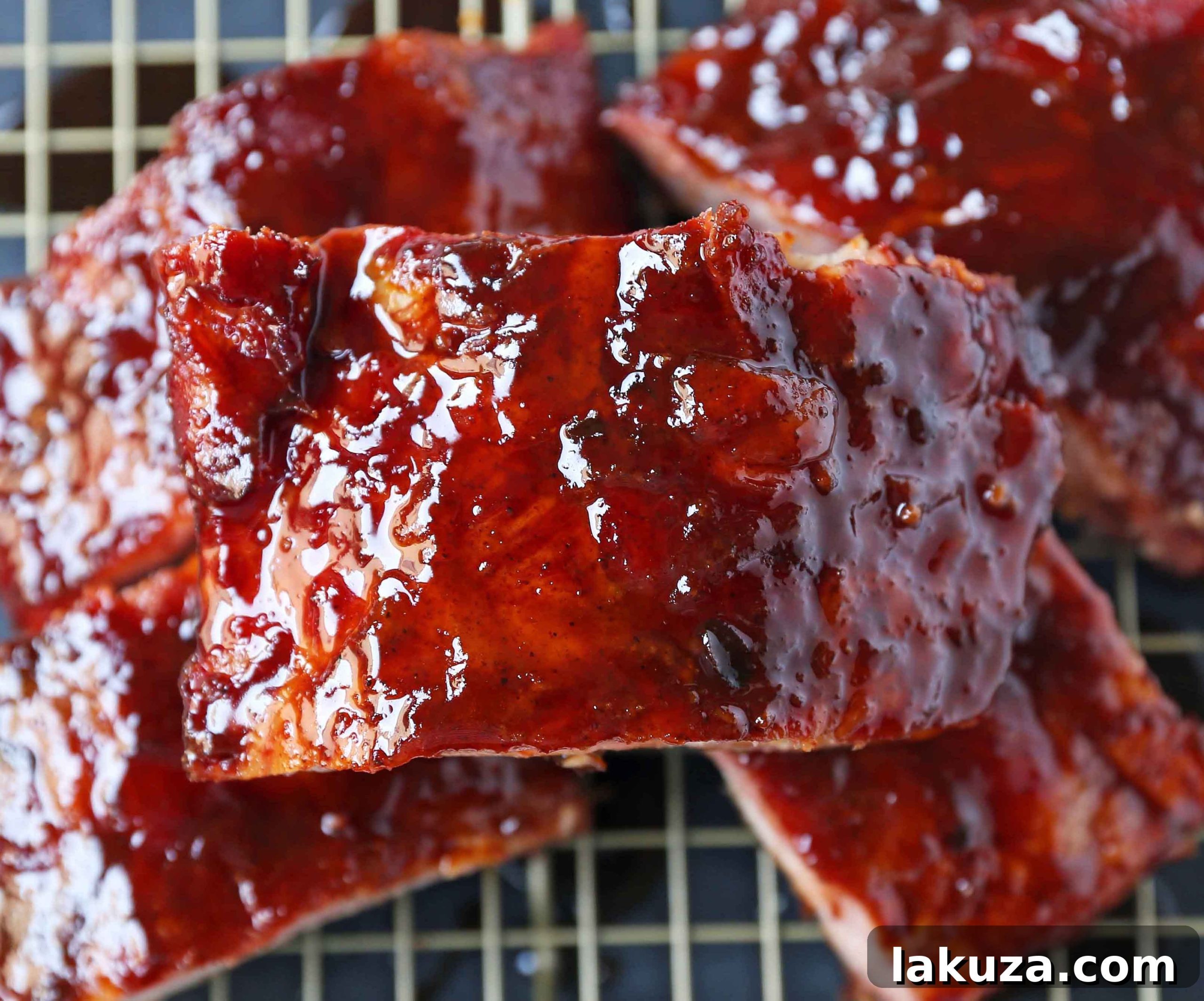Smoked Baby Back Ribs. Tender, flavorful, fall-off-the-bone Pork Baby Back Ribs. How to smoke ribs or cook in the oven. Perfect BBQ Rub Recipe. #ribs #babybackribs