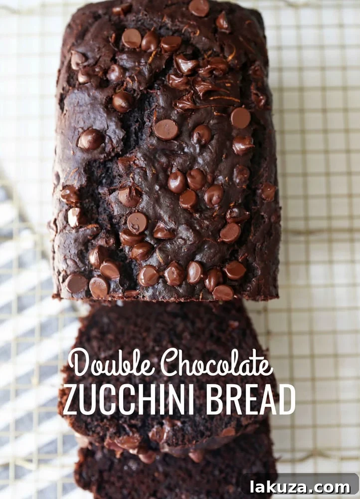 Chocolate Zucchini Bread. A rich double chocolate zucchini bread with chocolate chips recipe. You will never know there is zucchini in this chocolate bread! It is moist, rich, and a chocolate lover's dream! www.modernhoney.com #zucchinibread #chocolatezucchinibread #zucchinirecipes