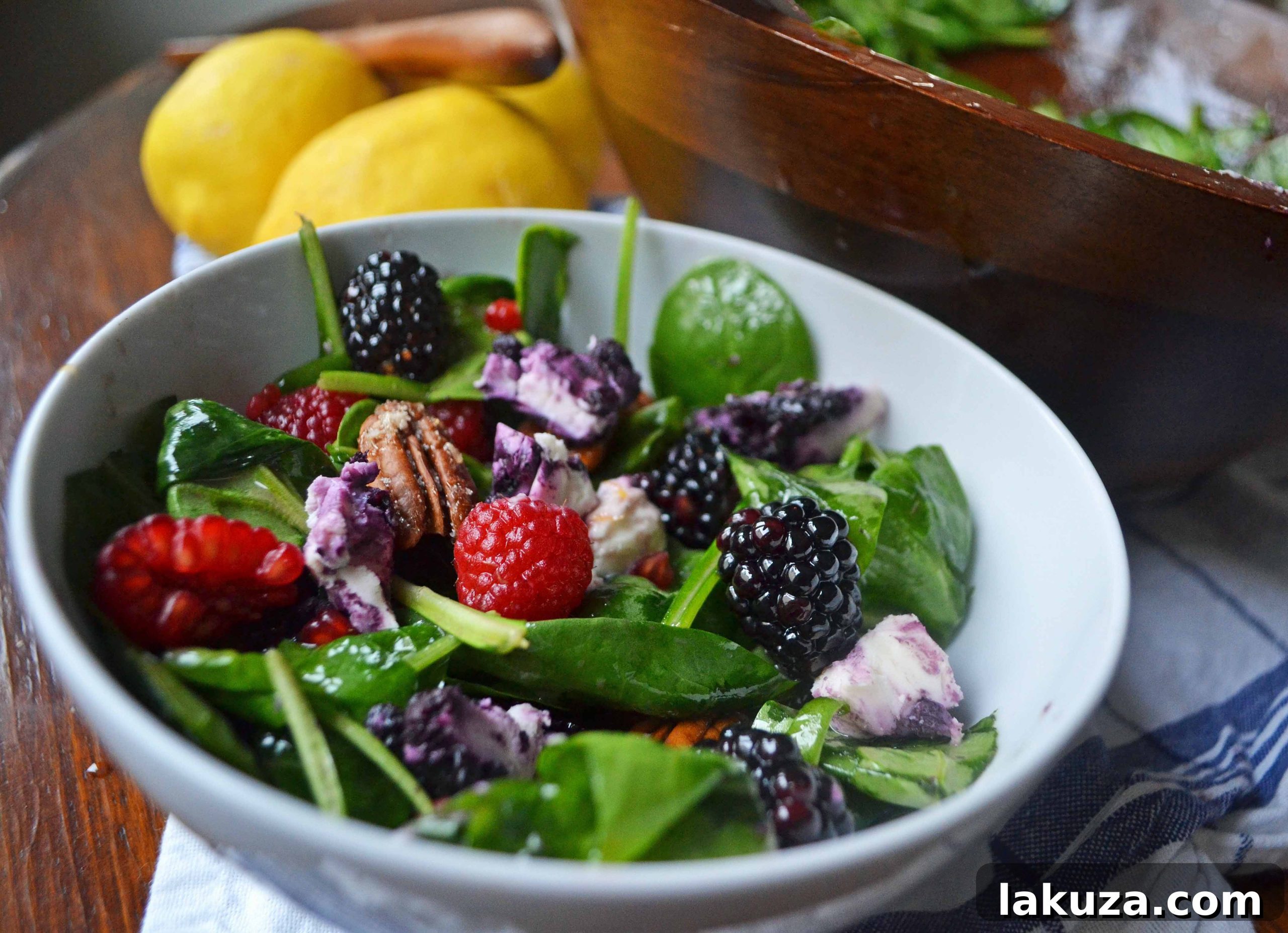 Sweet Berry Pecan Salad with Zesty Lemon Vanilla Bean Vinaigrette 3 Finished Berry Candied Pecan Salad with Lemon Vanilla Bean Dressing ready to serve
