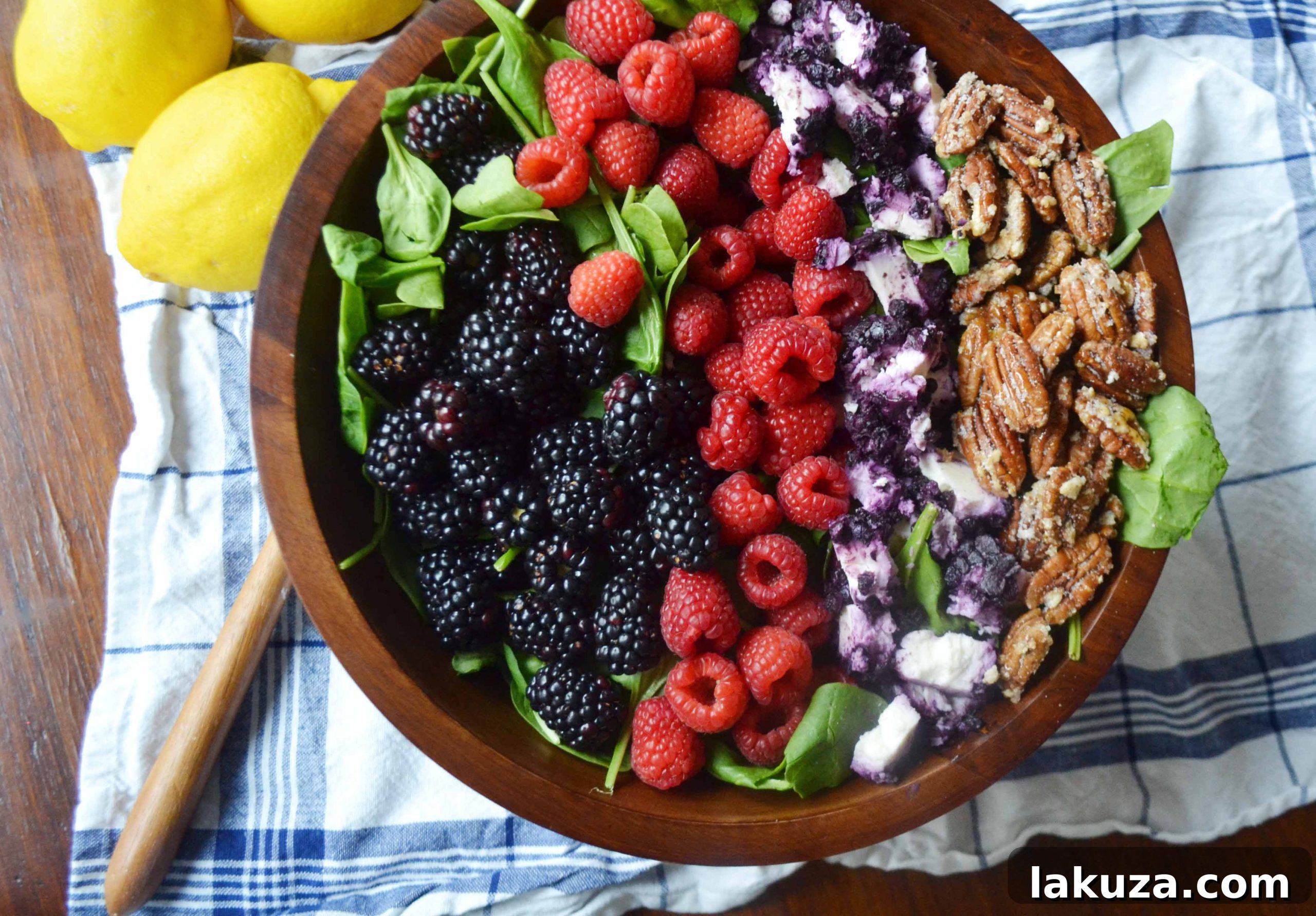 Sweet Berry Pecan Salad with Zesty Lemon Vanilla Bean Vinaigrette 5 Detailed shot of Berry Candied Pecan Salad dressing and ingredients