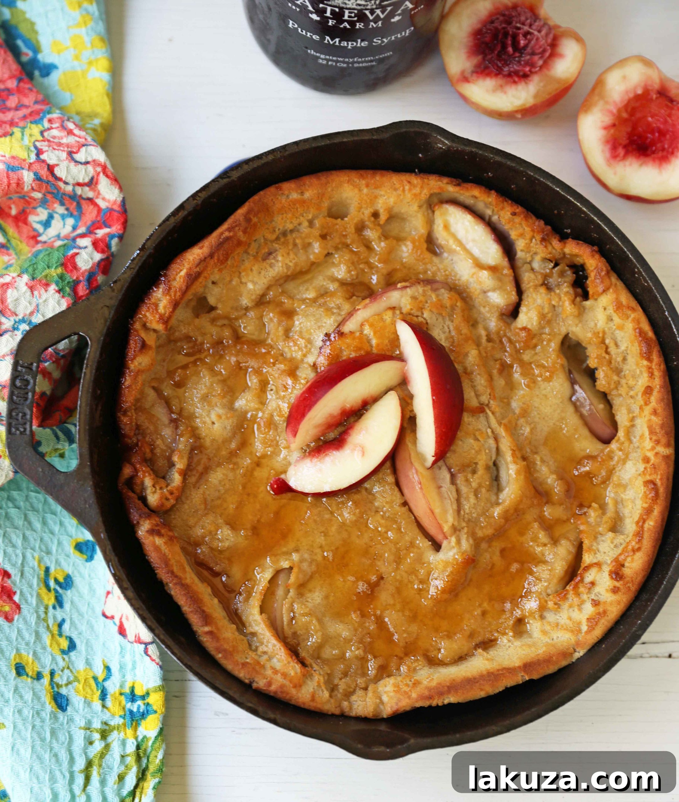Caramelized Brown Sugar Peach Dutch Baby 2 Delicious Brown Sugar Peach Dutch Baby fresh from the oven, topped with powdered sugar and ready to serve