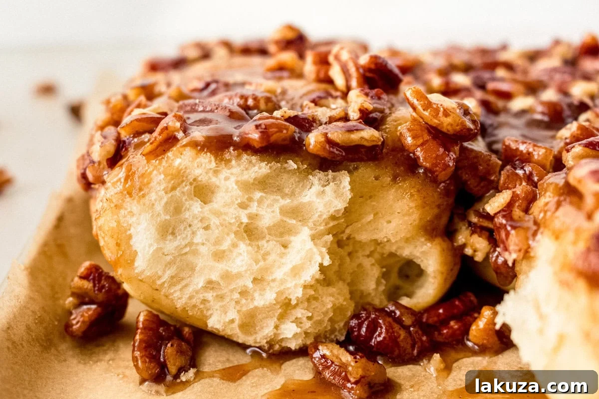 Caramel pecan sticky buns also known as caramel pecan rolls are homemade sweet rolls filled with a brown sugar cinnamon filling and topped with a rich caramel sauce and pecans. Sweet, nutty, and rich, this is the best sticky bun recipe!