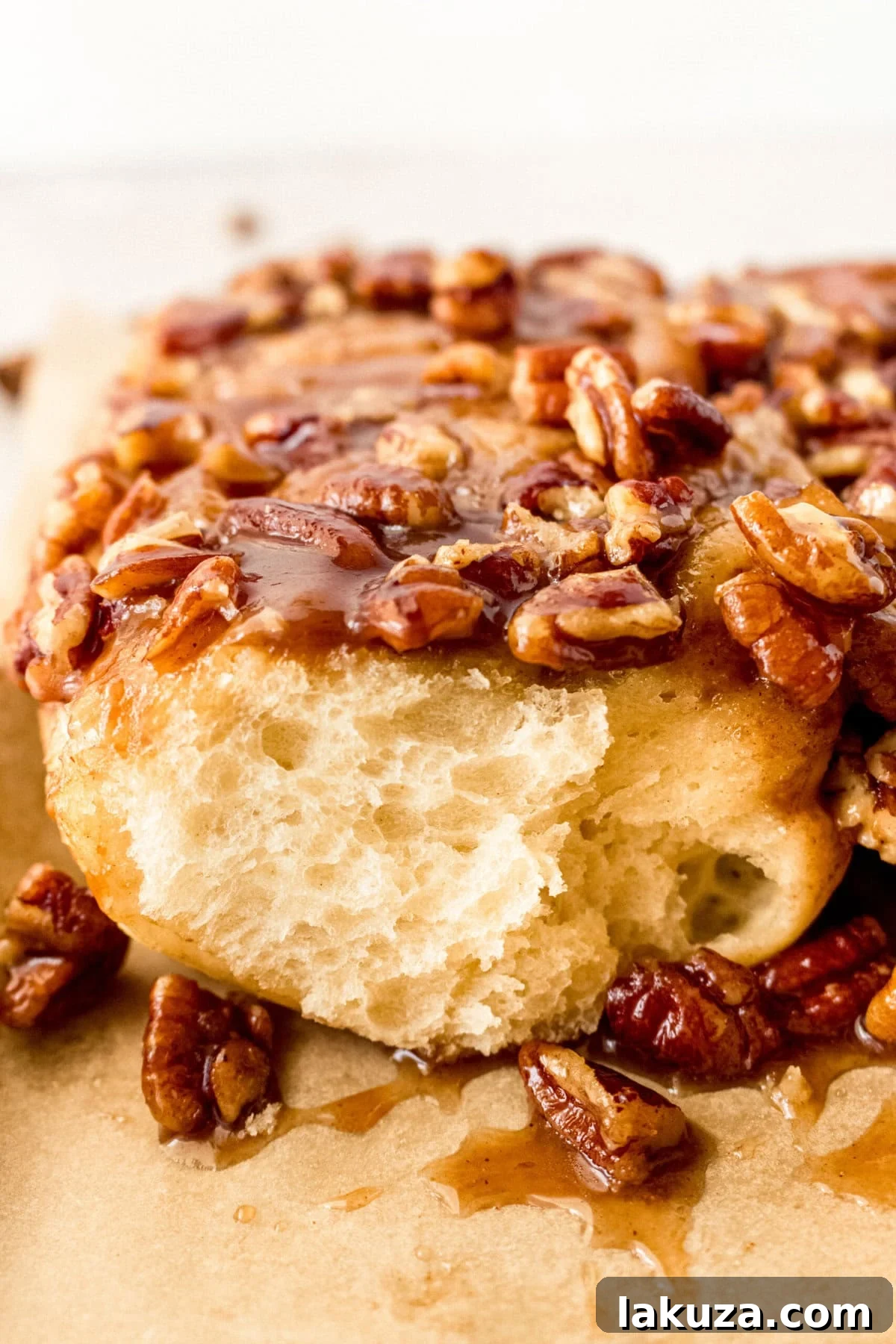Caramel pecan sticky buns also known as caramel pecan rolls are homemade sweet rolls filled with a brown sugar cinnamon filling and topped with a rich caramel sauce and pecans. Sweet, nutty, and rich, this is the best sticky bun recipe!