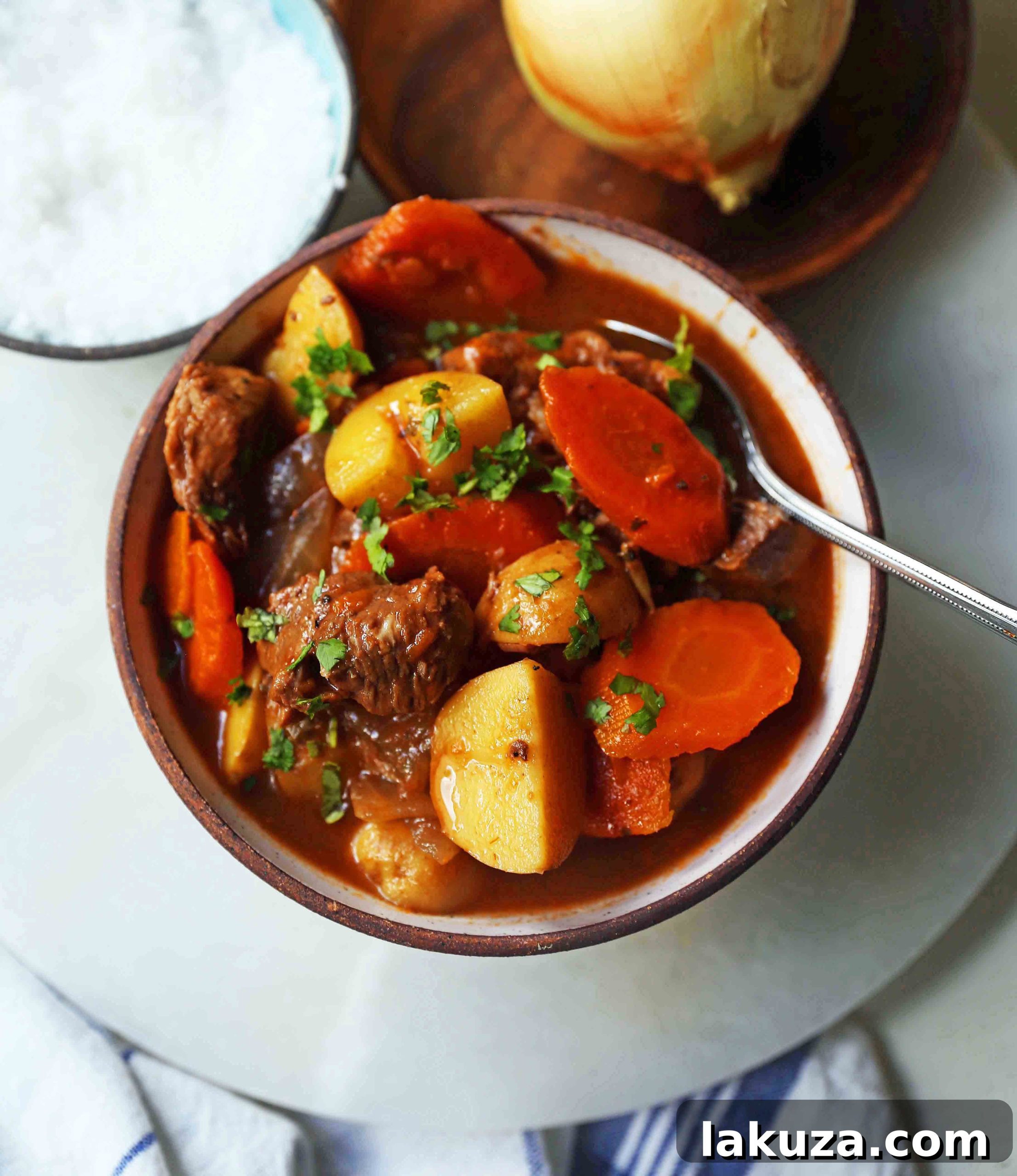 Hearty Beef Stew: The ultimate healthy comfort food recipe with lean beef, Yukon Gold potatoes, carrots, onions, and a rich savory broth.