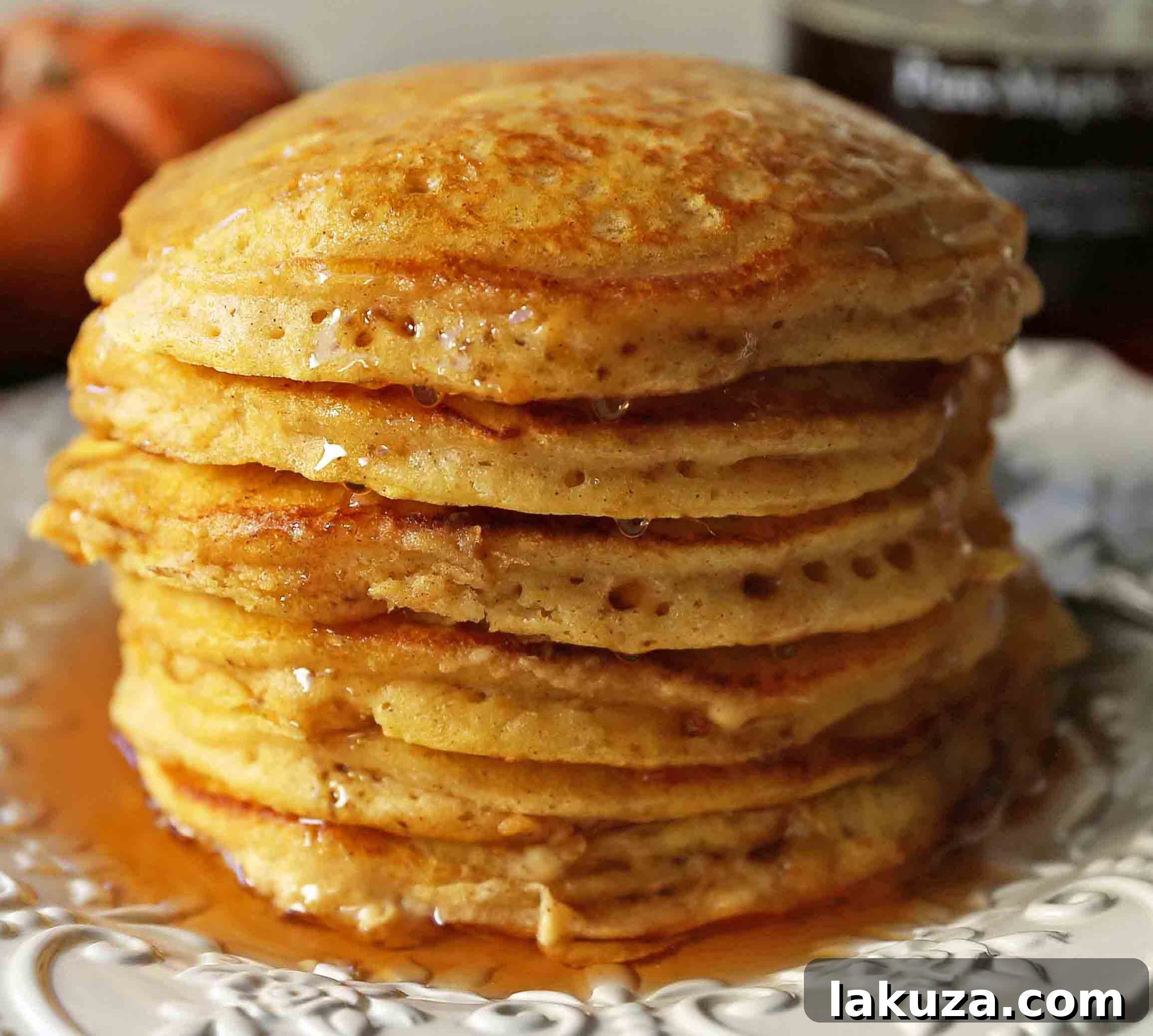 Cozy Pumpkin Spice Flapjacks 6 A stack of five fluffy pumpkin pancakes, ready to be enjoyed. The perfect Fall recipe for a cozy morning breakfast.