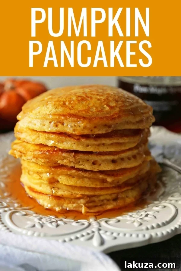 Cozy Pumpkin Spice Flapjacks 7 A bottle of authentic maple syrup pouring over a stack of fluffy pumpkin pancakes. The essential topping for any Fall breakfast.