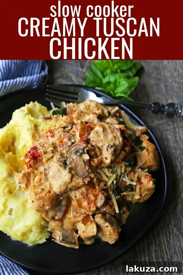 Serving of Slow Cooker Creamy Tuscan Chicken with pasta and fresh basil.