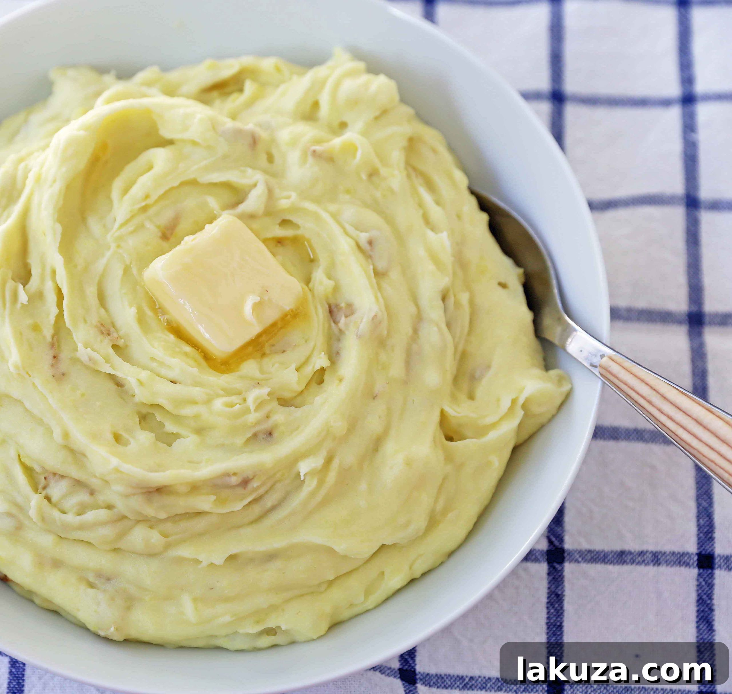 Velvety Smooth Mashed Potatoes 2 Perfect Creamy Mashed Potatoes: A simple, foolproof recipe for the best classic mashed potatoes. Ideal for Thanksgiving and other holiday feasts. Learn how to make rich, fluffy, and incredibly moist mashed potatoes every time!