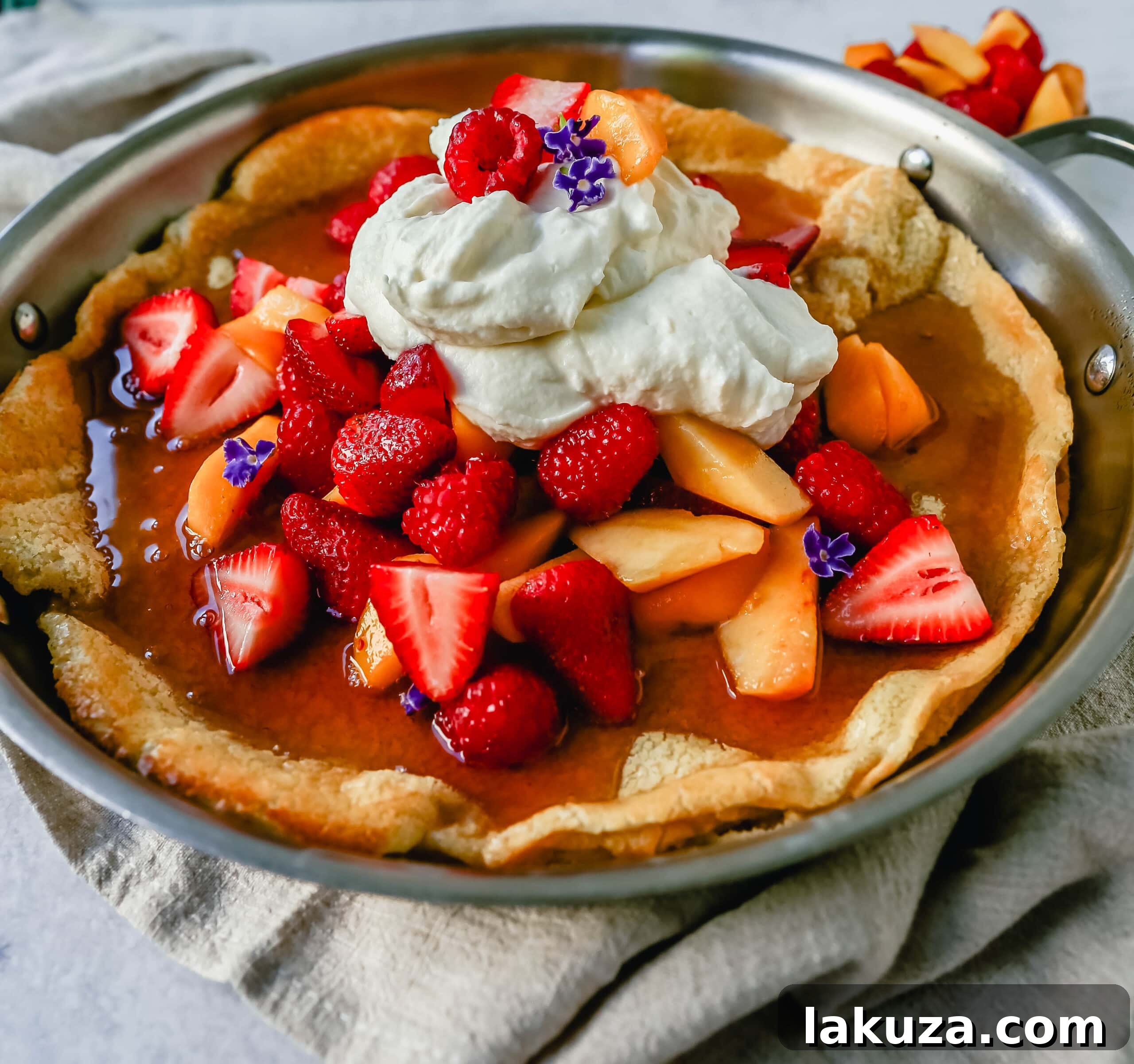 Puffy Oven Pancake 2 A decadent Dutch Baby Puff Pancake is made with milk, eggs, sugar, flour, and vanilla, and baked in a cast iron skillet in the oven until it puffs up and becomes a golden brown. A delicious and easy breakfast dish!
