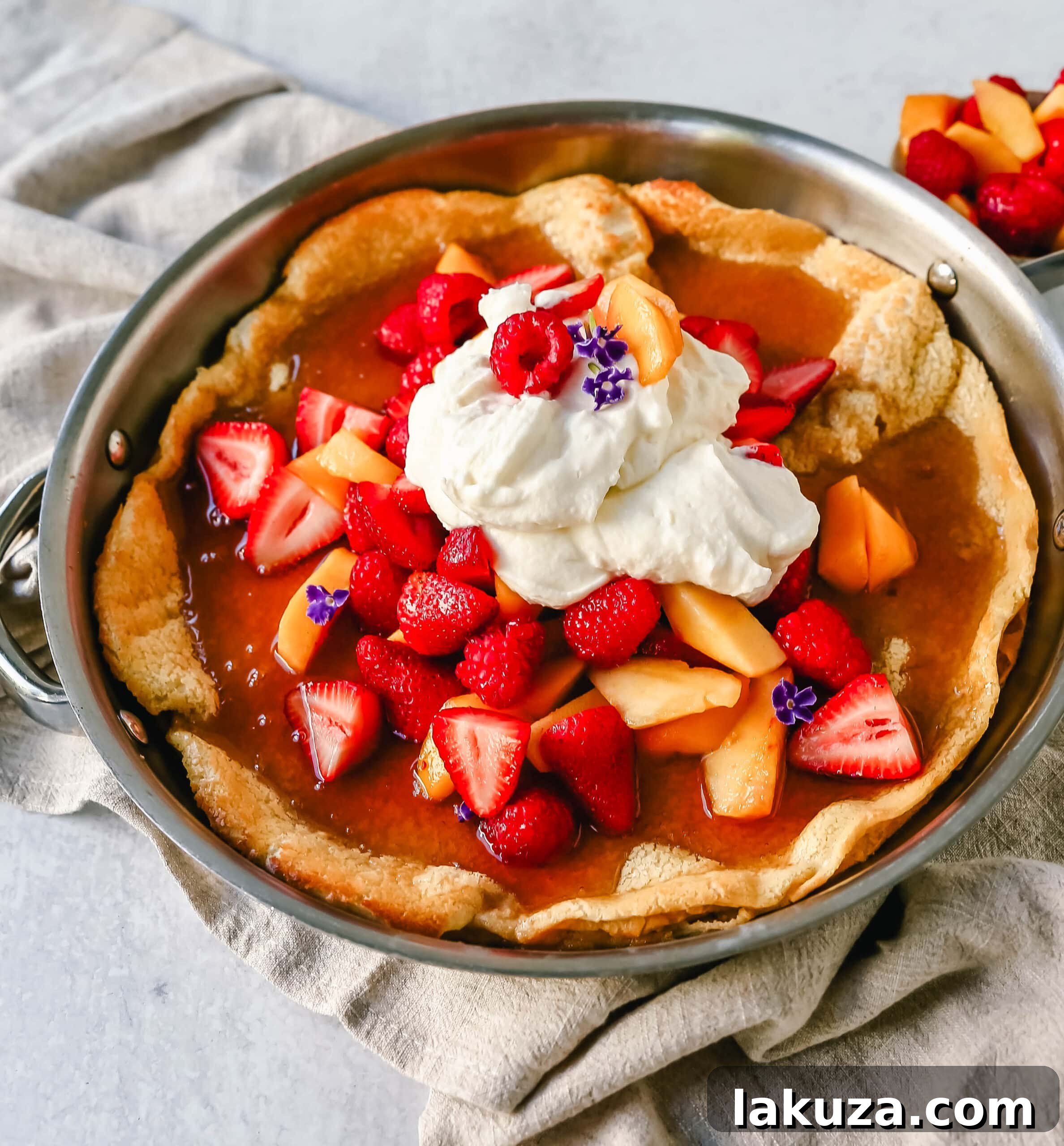 Puffy Oven Pancake 3 A decadent Dutch Baby Puff Pancake is made with milk, eggs, sugar, flour, and vanilla, and baked in a cast iron skillet in the oven until it puffs up and becomes a golden brown. A delicious and easy breakfast dish!