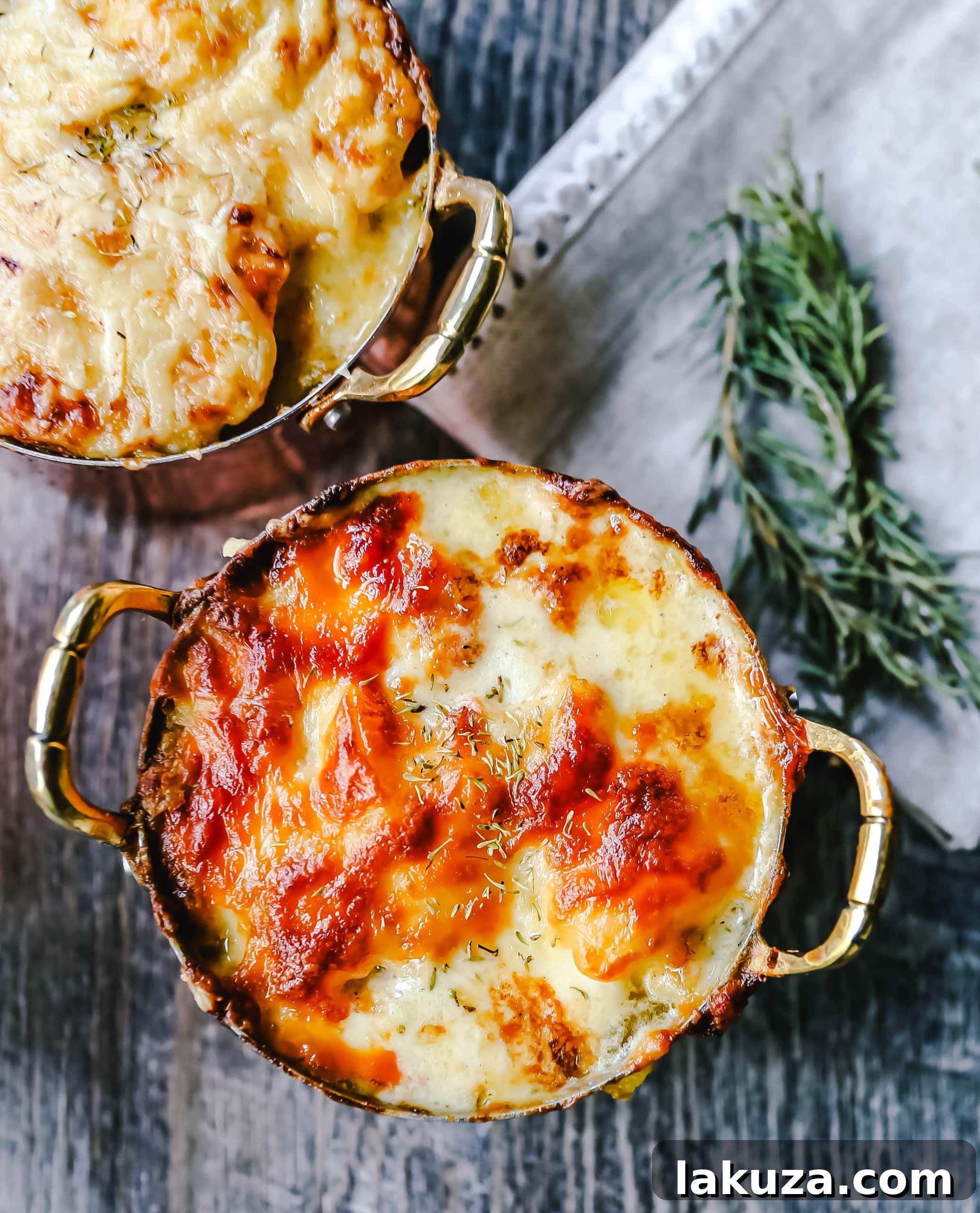 Mouthwatering Cheesy Potato Gratin 2 Rich and creamy cheesy potatoes au gratin, a perfect homemade side dish with tender potatoes, a luxurious cream sauce, and golden melted cheddar cheese.